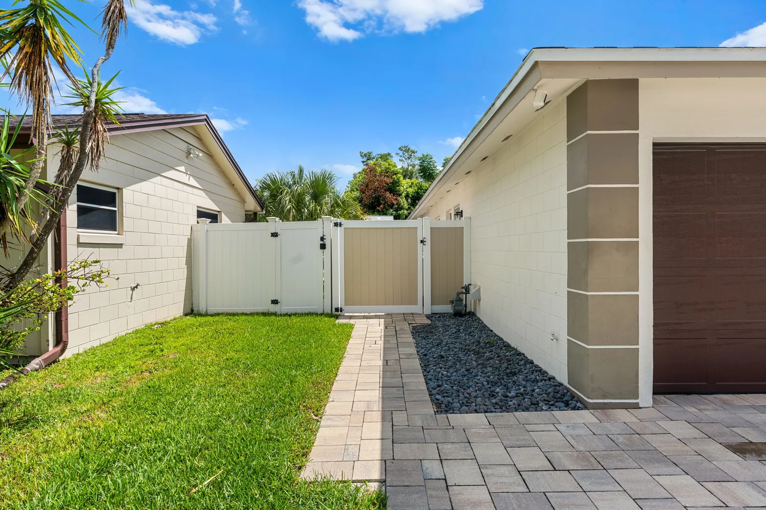 a backyard of a house with lots of green space