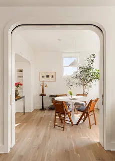 a workspace with furniture and window