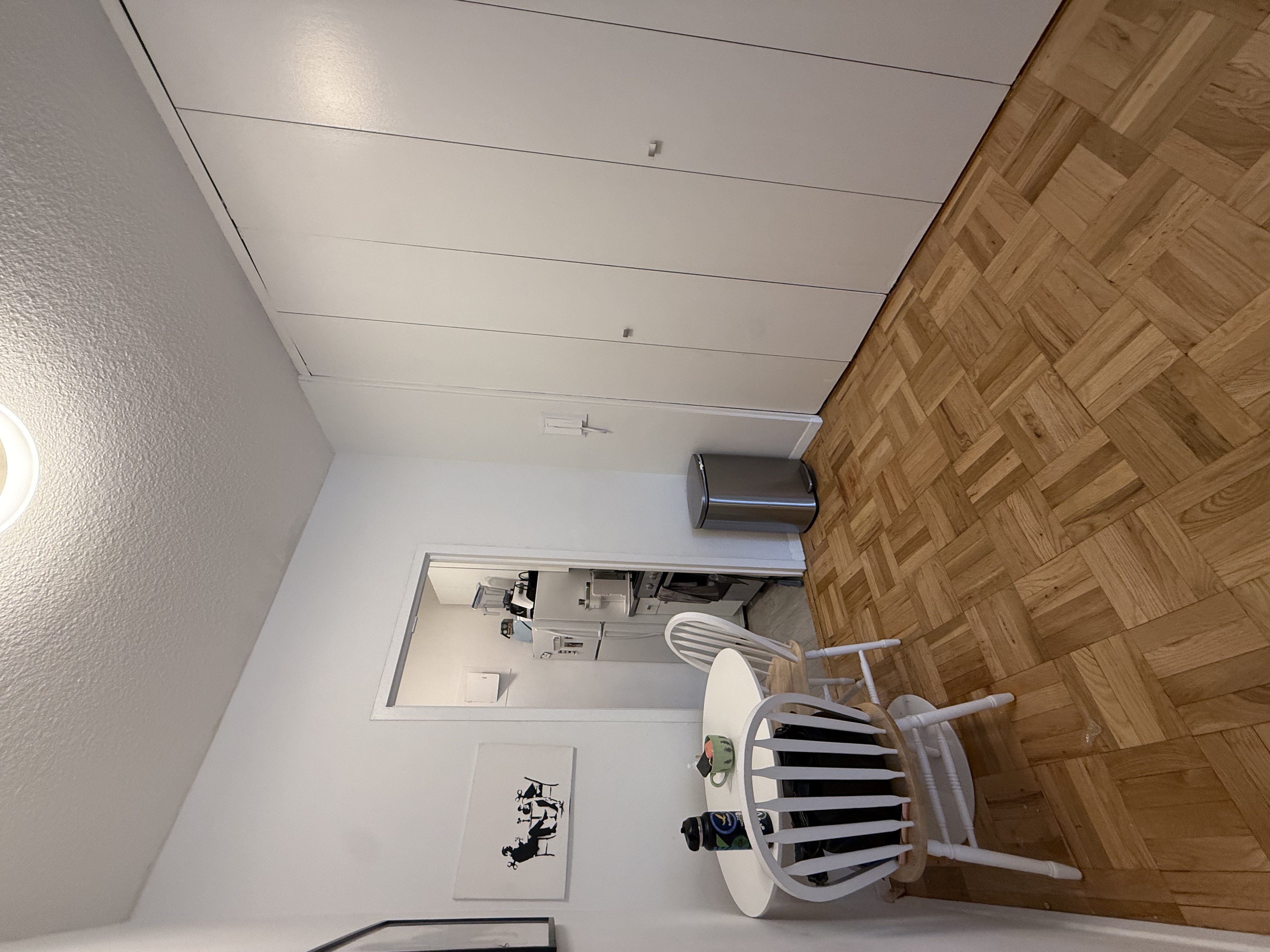 60 East 8th Street, Unit 9J Manhattan, NY 10003 - Photo 11 of 13 a view of a livingroom with furniture and window