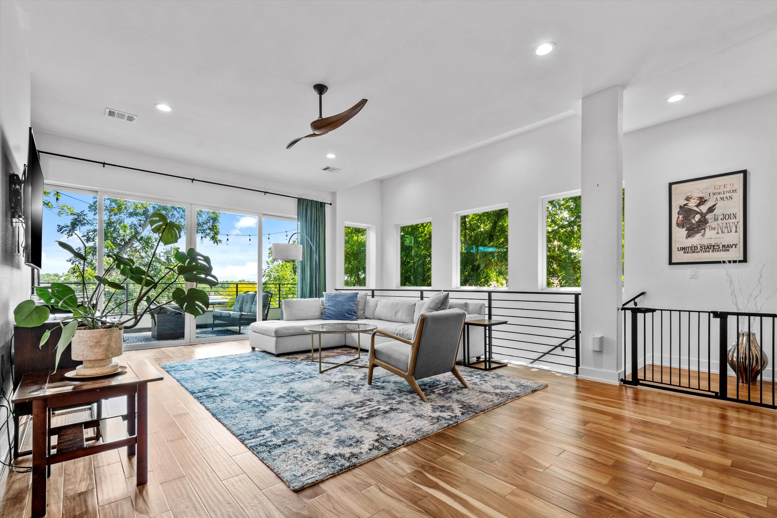2712 Oak Springs Drive, Unit A Austin, TX 78702 - Photo 27 of 38 a living room with furniture and a large window