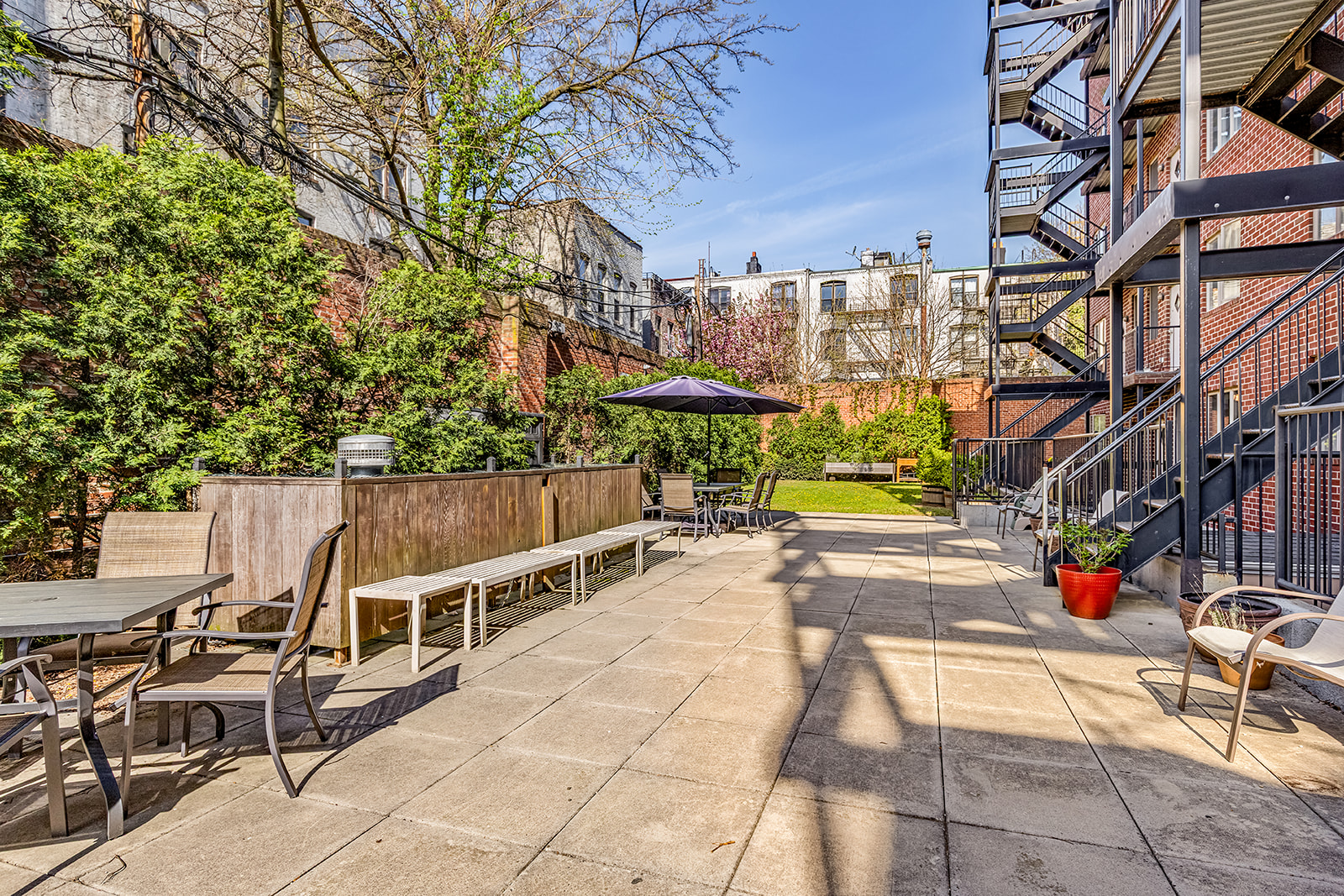 372 15th Street, Unit 2A Brooklyn, NY 11215 - Photo 9 of 10 a view of a patio with table and chairs and potted plants
