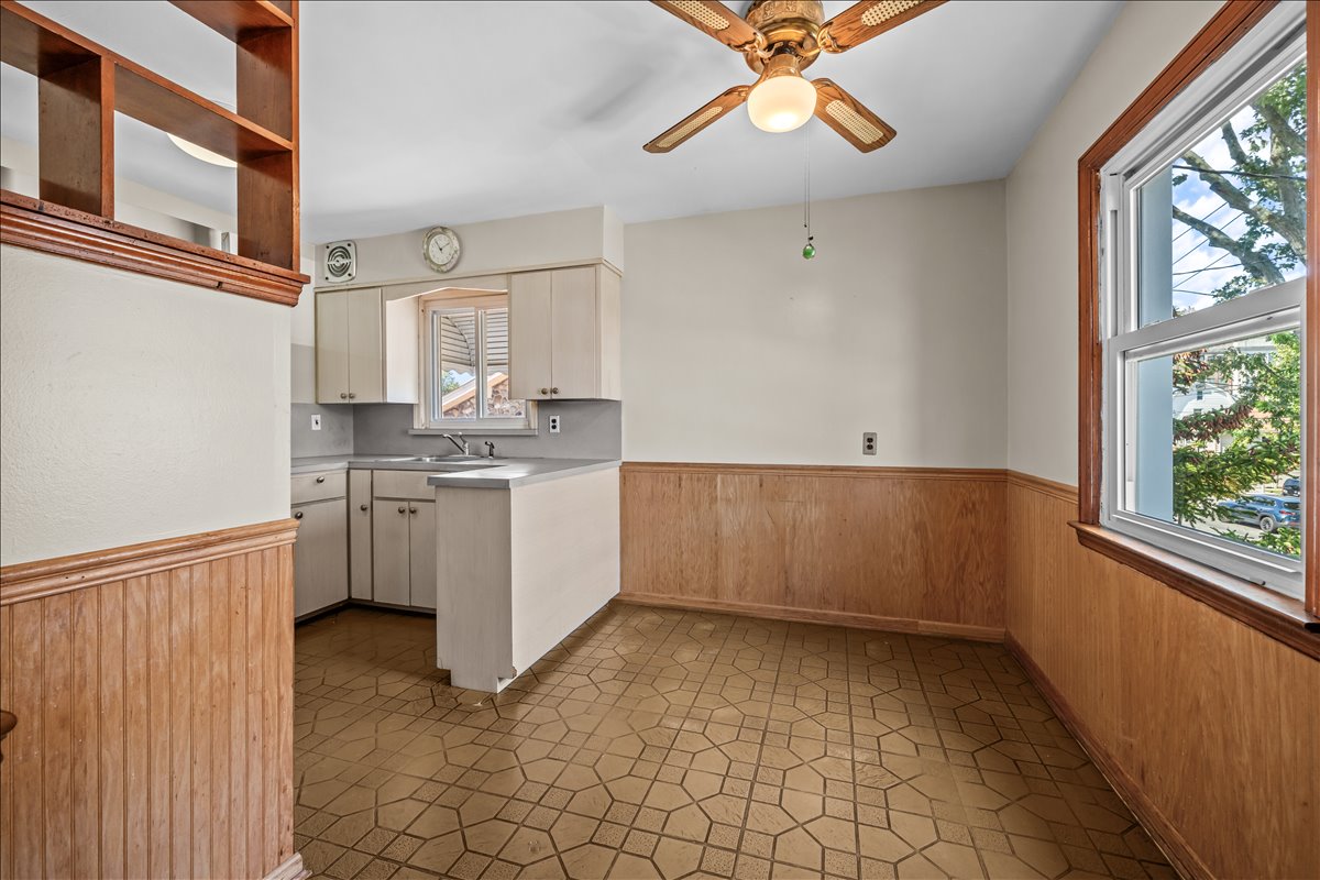100-14 159th Avenue Queens, NY 11414 - Photo 11 of 26 a view of kitchen with stainless steel appliances cabinets and window