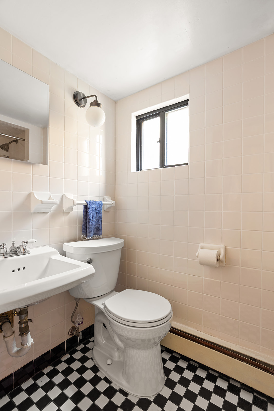 26 Fuller Place Brooklyn, NY 11215 - Photo 8 of 14 a bathroom with a sink toilet and vanity