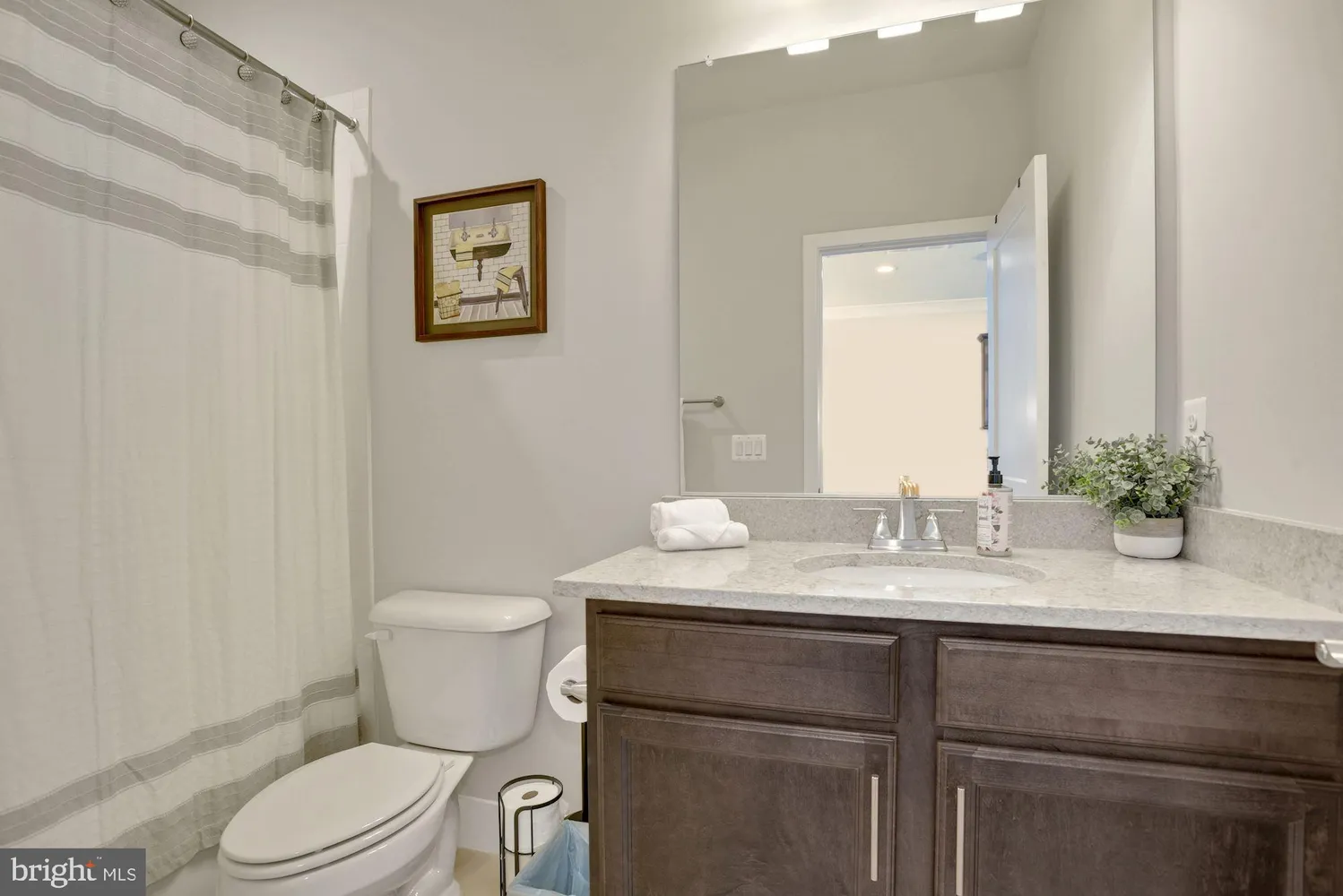 a view of a terrace with a chair and a fireplace