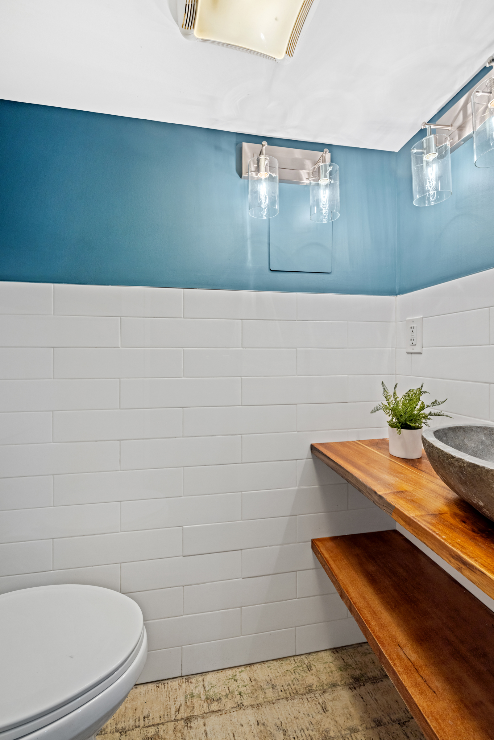 439 A Monroe Street Brooklyn, NY 11221 - Photo 28 of 29 a bathroom with a toilet and a sink