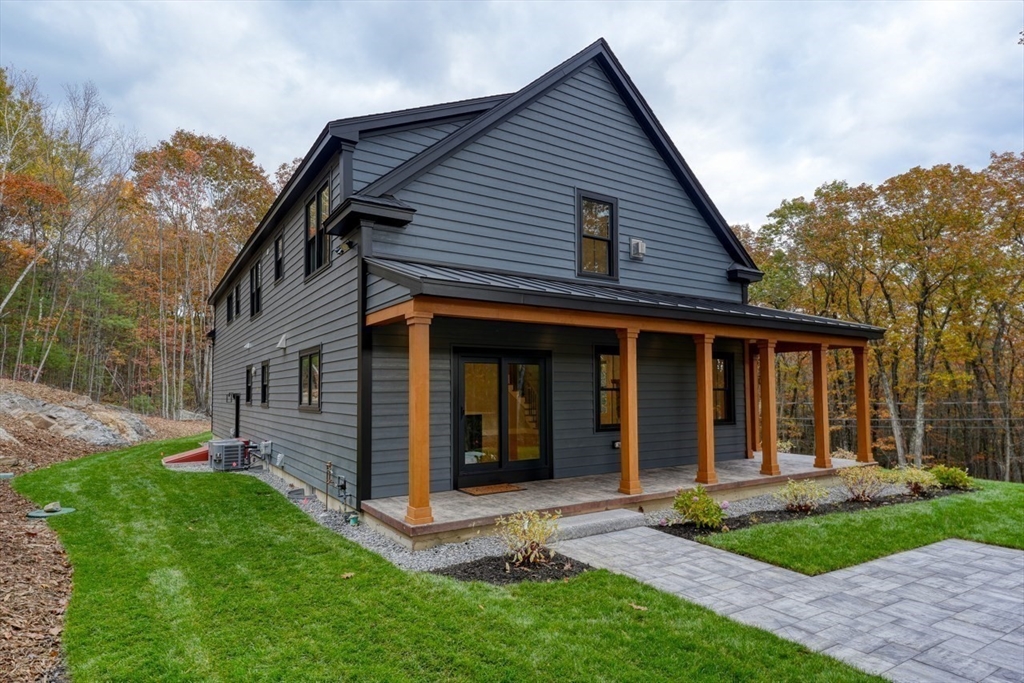 171 Randall Road Berlin, MA 01503 - Photo 37 of 41 a view of a house with garden