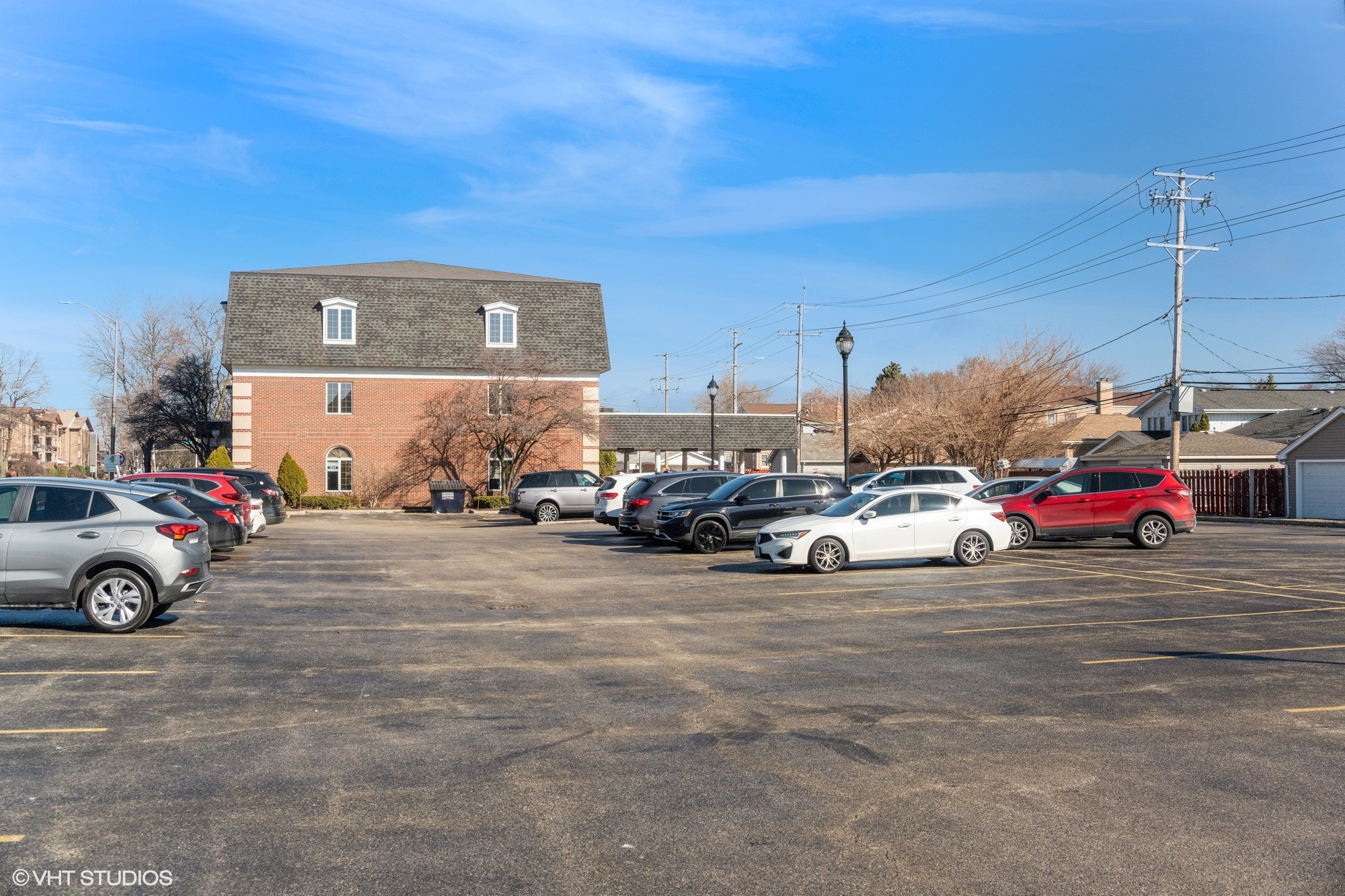 9401 South Pulaski Road, Unit 3N Evergreen Park, IL 60805 - Photo 11 of 12 a view of street with parked cars