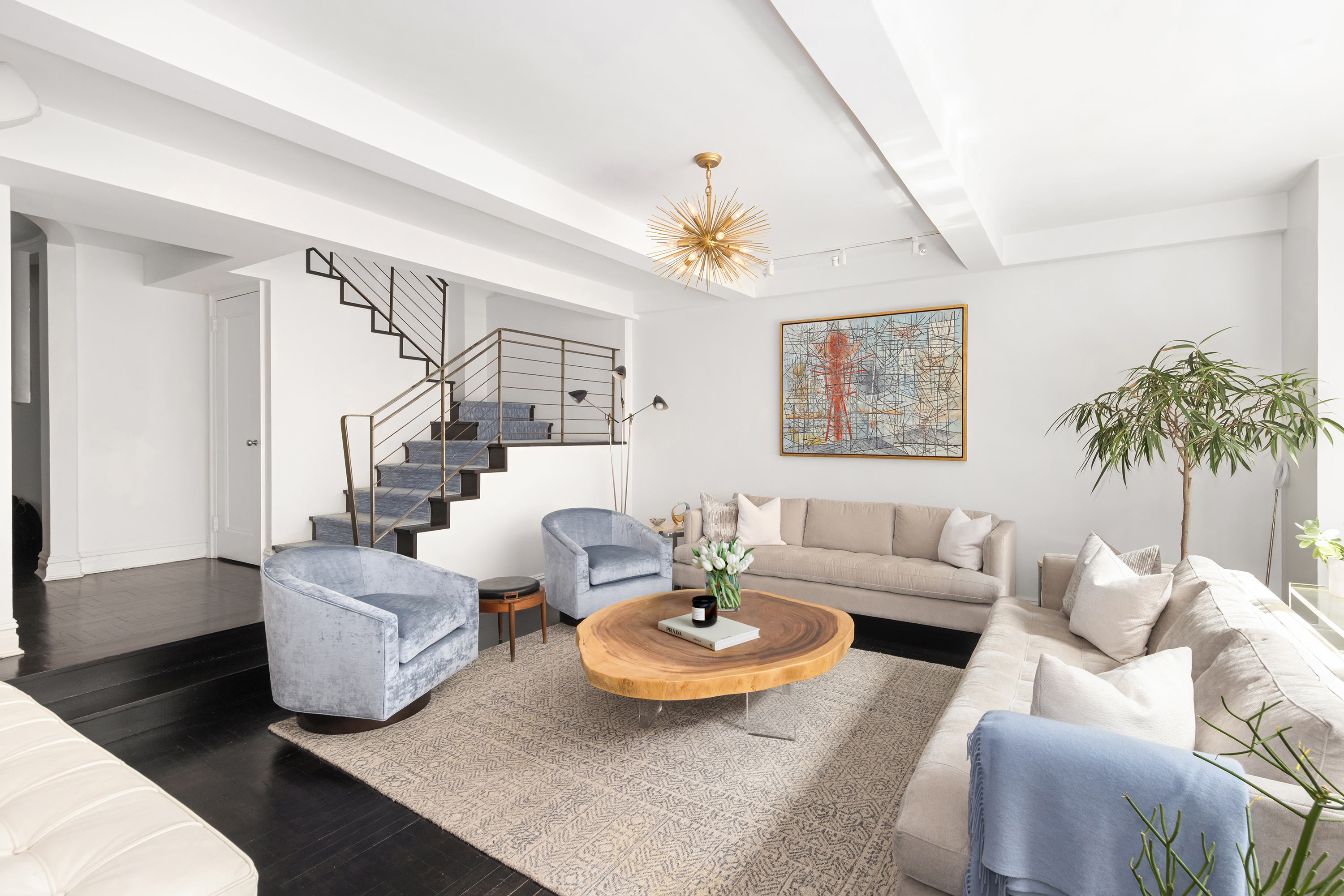 411 West End Avenue, Unit 3B/4B Manhattan, NY 10024 - Photo 2 of 16 a living room with furniture and a large window