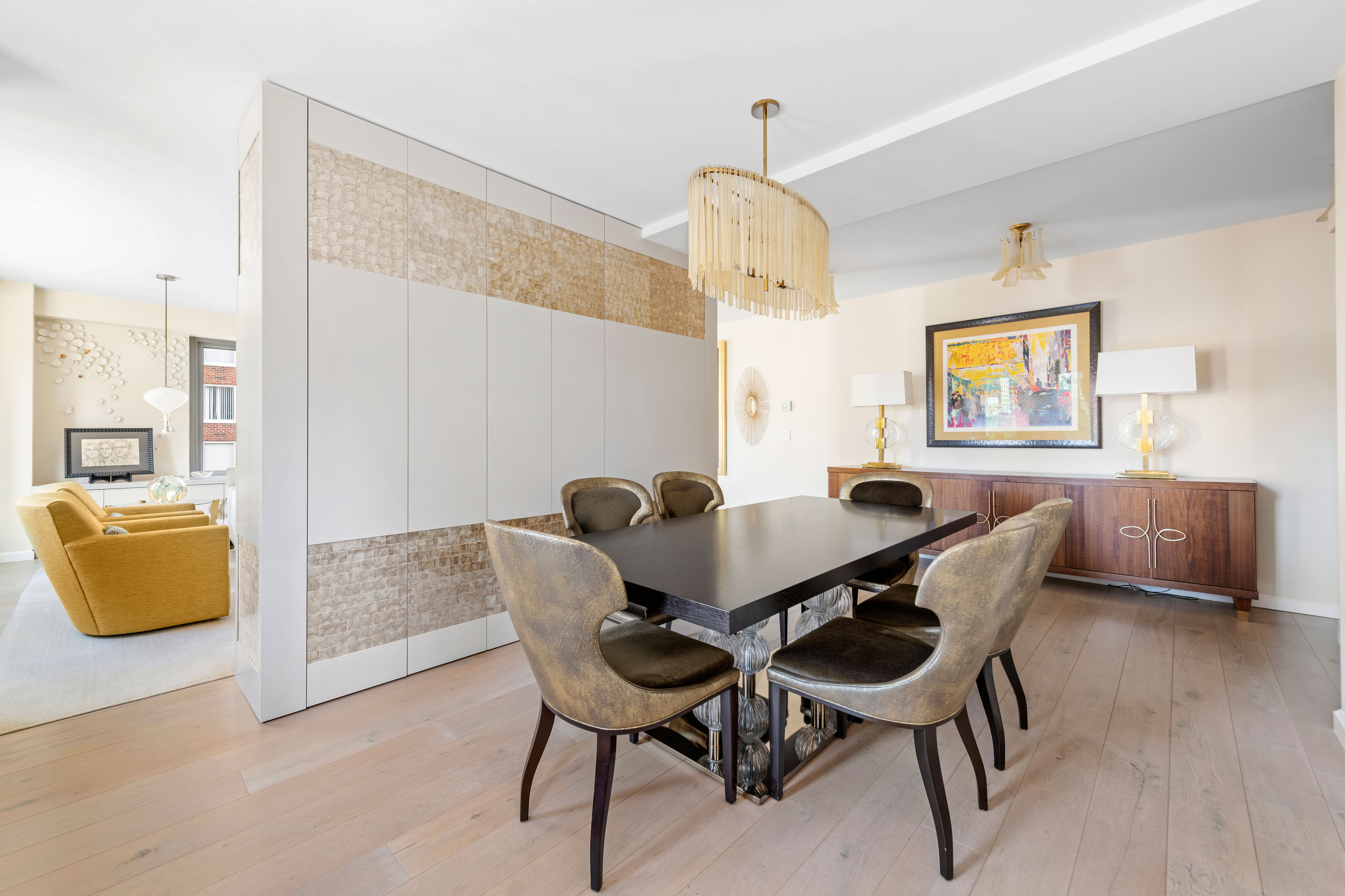 200 East 62nd Street, Unit 5A Manhattan, NY 10065 - Photo 7 of 25 a view of a dining room with furniture