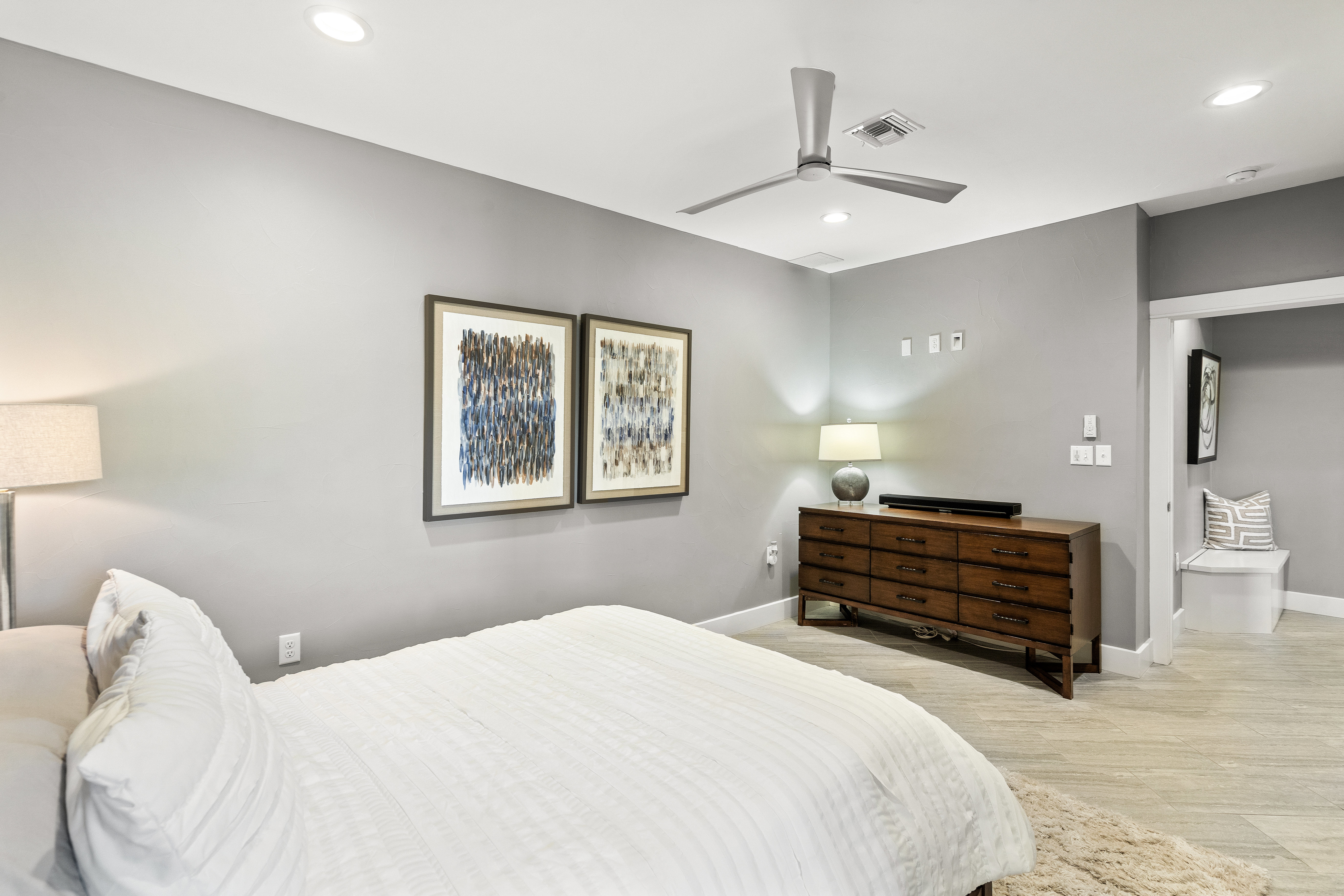 15210 Rainbow 1 Street Austin, TX 78734 - Photo 84 of 138 a bedroom with a bed and a chandelier