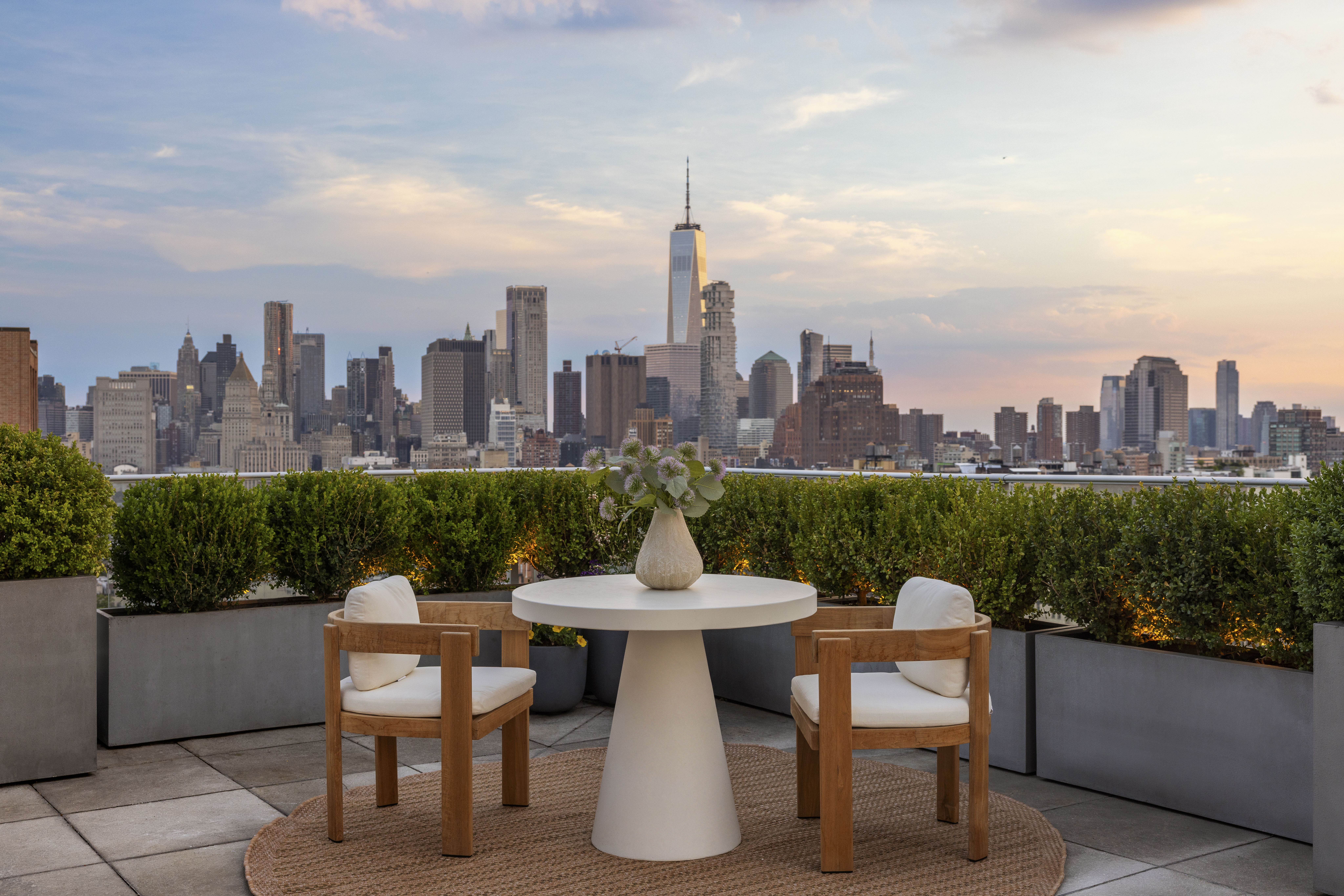 52 East 4th Street, Unit PH3 Manhattan, NY 10003 - Photo 2 of 22 a view of a terrace with furniture and a garden