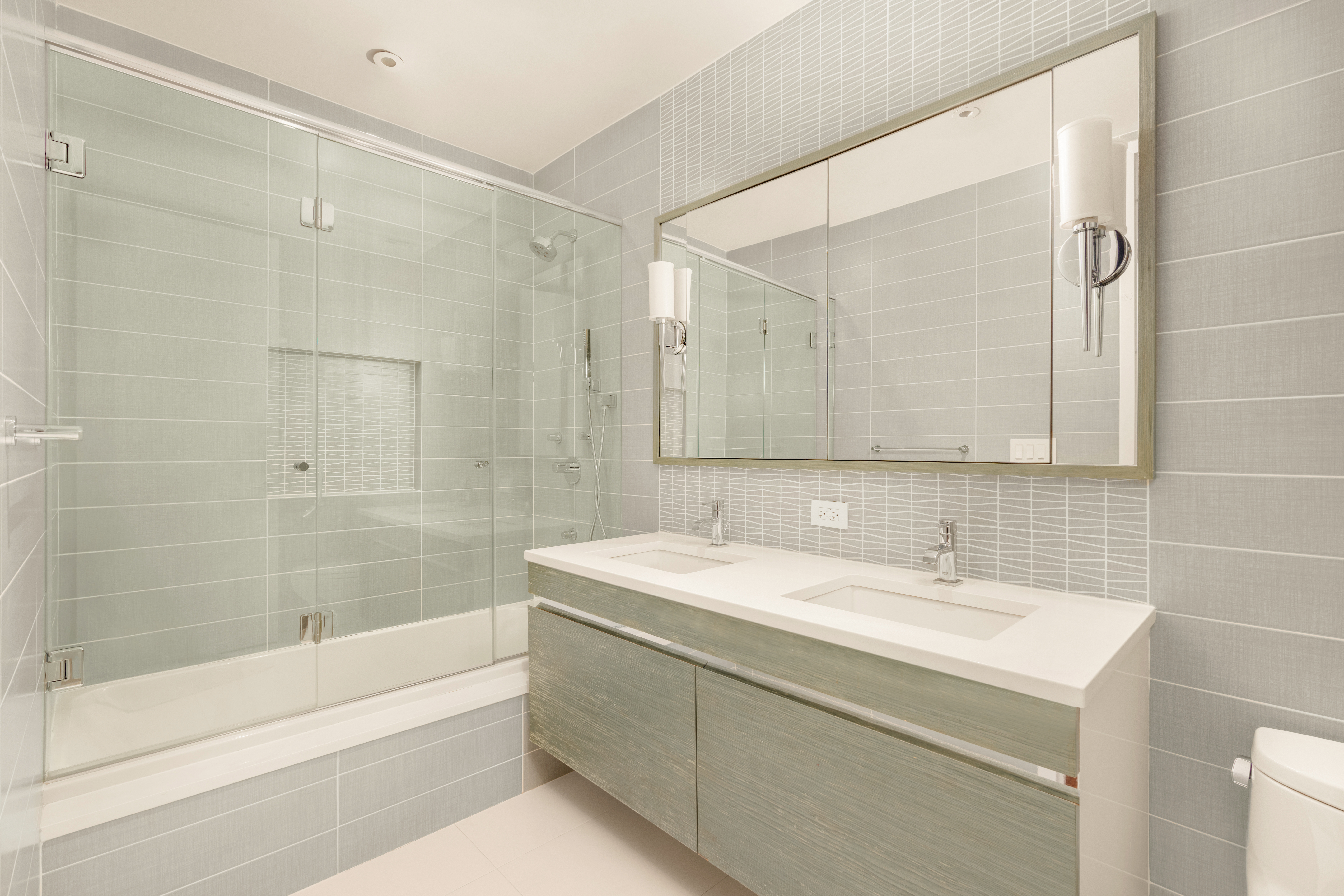 60 Beach Street, Unit 3C Manhattan, NY 10013 - Photo 7 of 9 a bathroom with a sink and a mirror