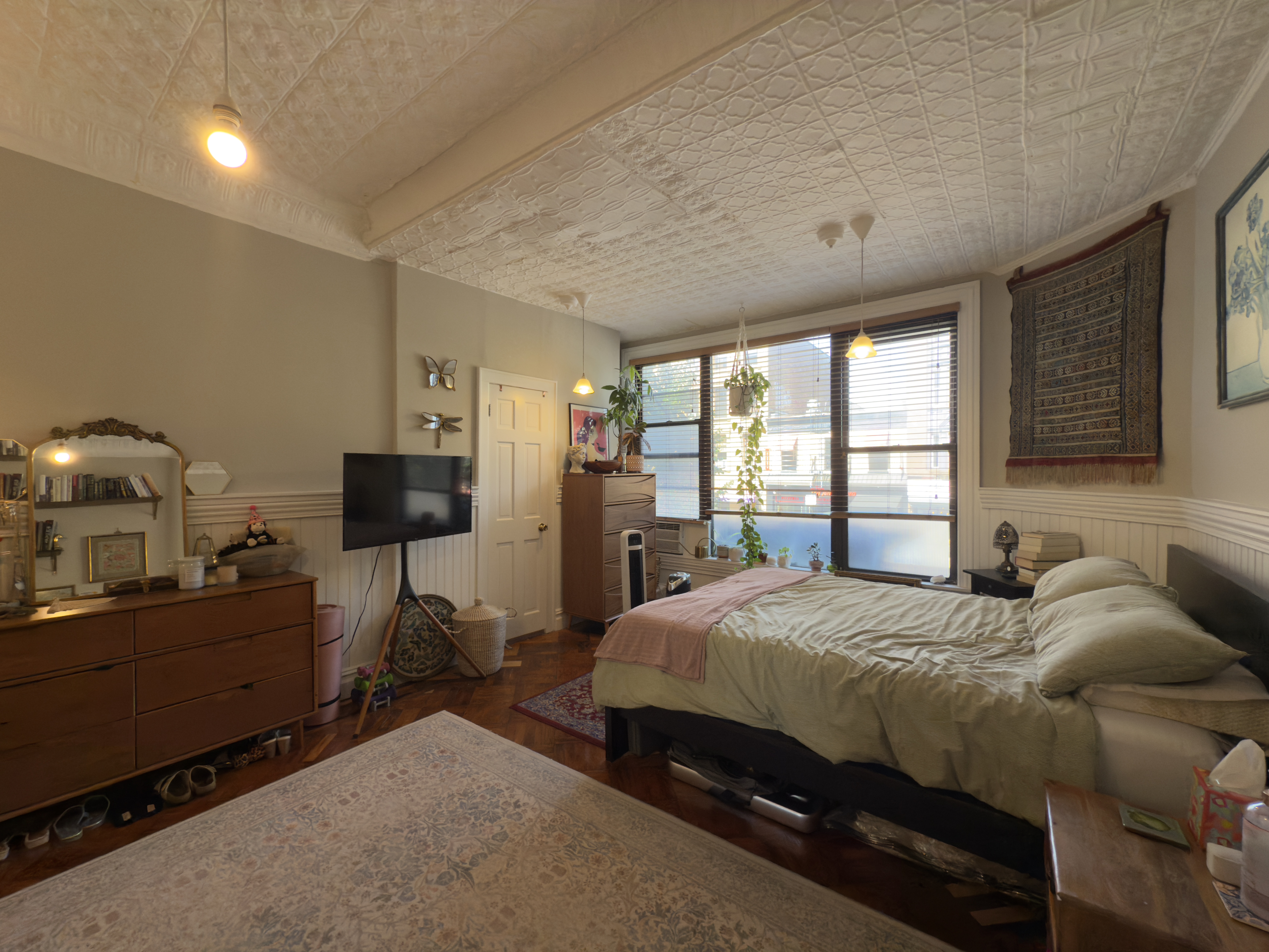 141 7th Avenue, Unit 1 Brooklyn, NY 11215 - Photo 13 of 16 a bedroom with a bed and window