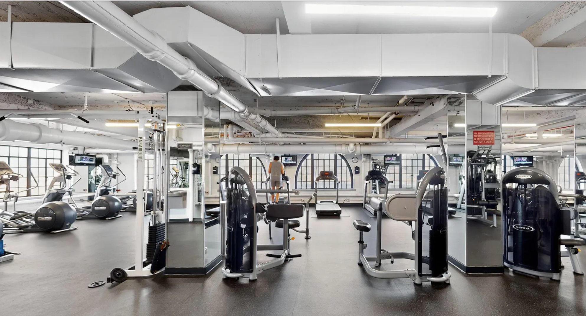 5 Tudor City Place, Unit 602 Manhattan, NY 10017 - Photo 17 of 20 a view of a room with gym equipment