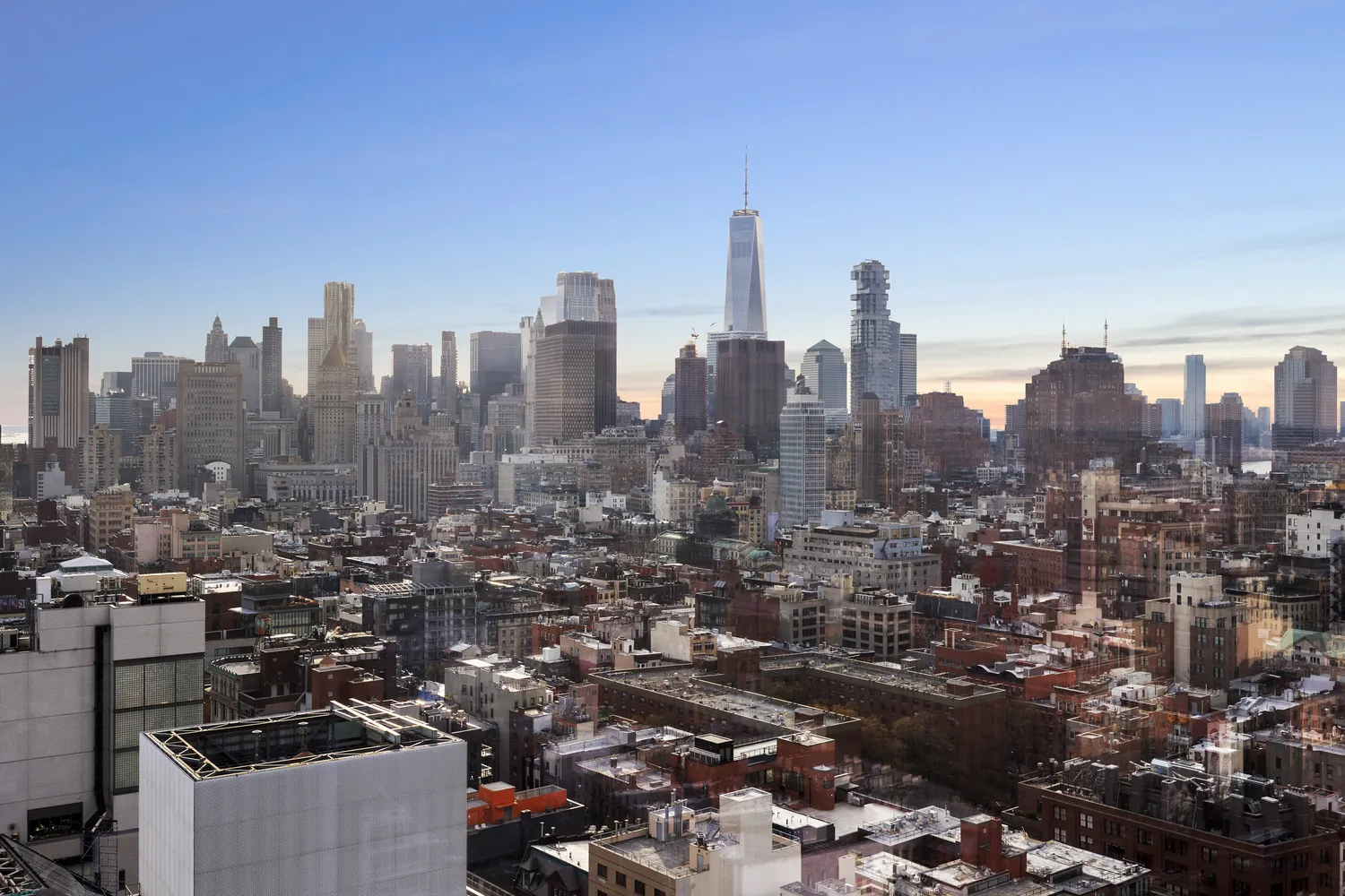 a view of a city with tall buildings