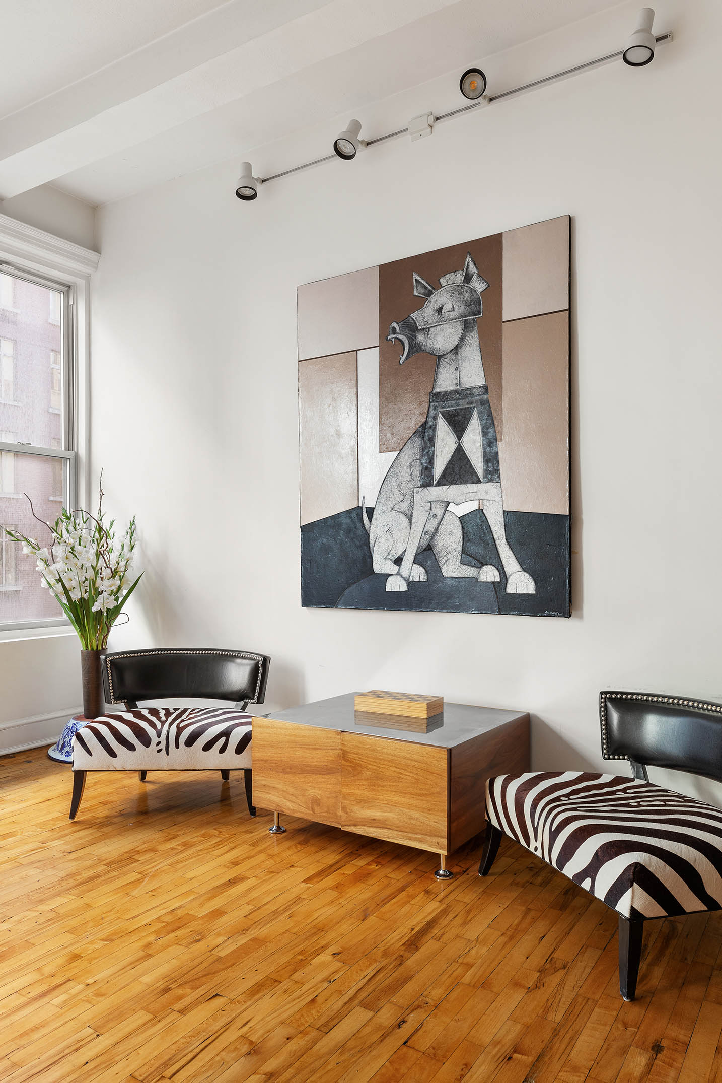 126 West 22nd Street, Unit 5N Manhattan, NY 10011 - Photo 12 of 13 a living room with furniture and wooden floor