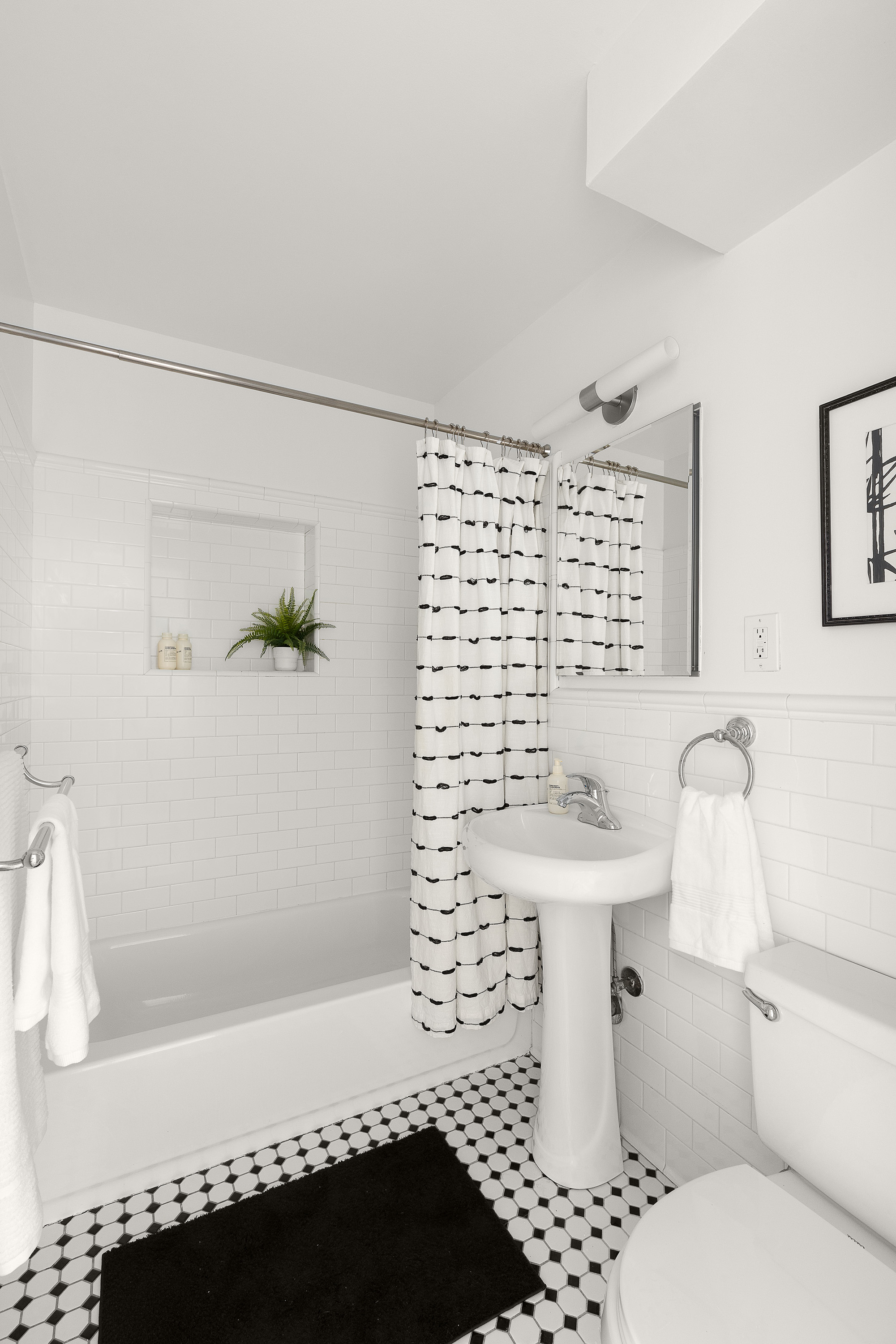 138 Baltic Street, Unit 4C Brooklyn, NY 11201 - Photo 11 of 12 a bathroom with a sink toilet and shower