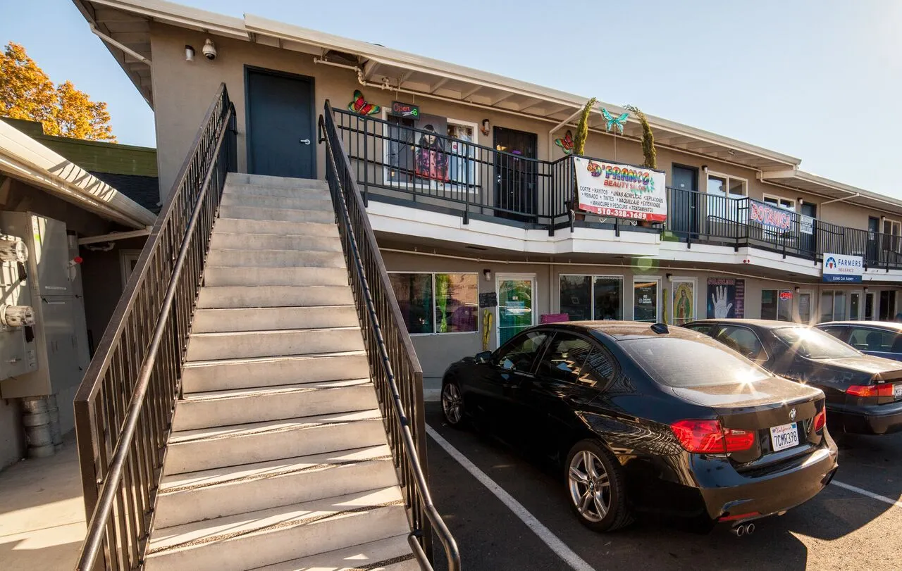 a car parked in front of a building