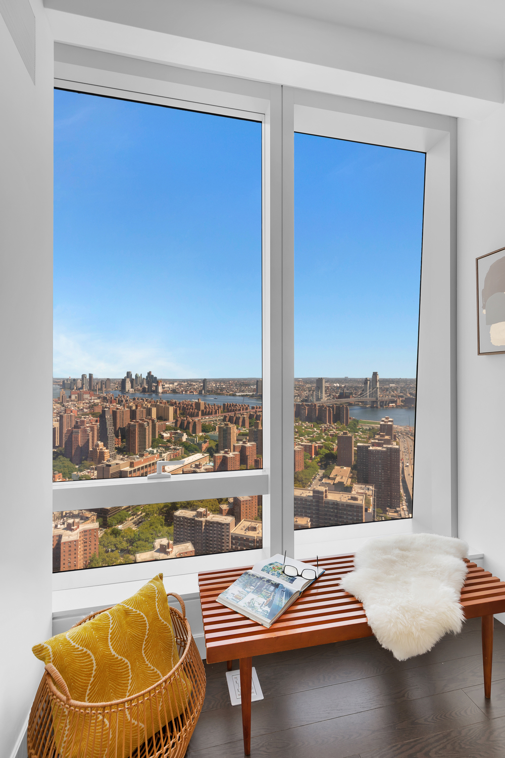 252 South Street, Unit 53E Manhattan, NY 10002 - Photo 5 of 17 a room with furniture and a window