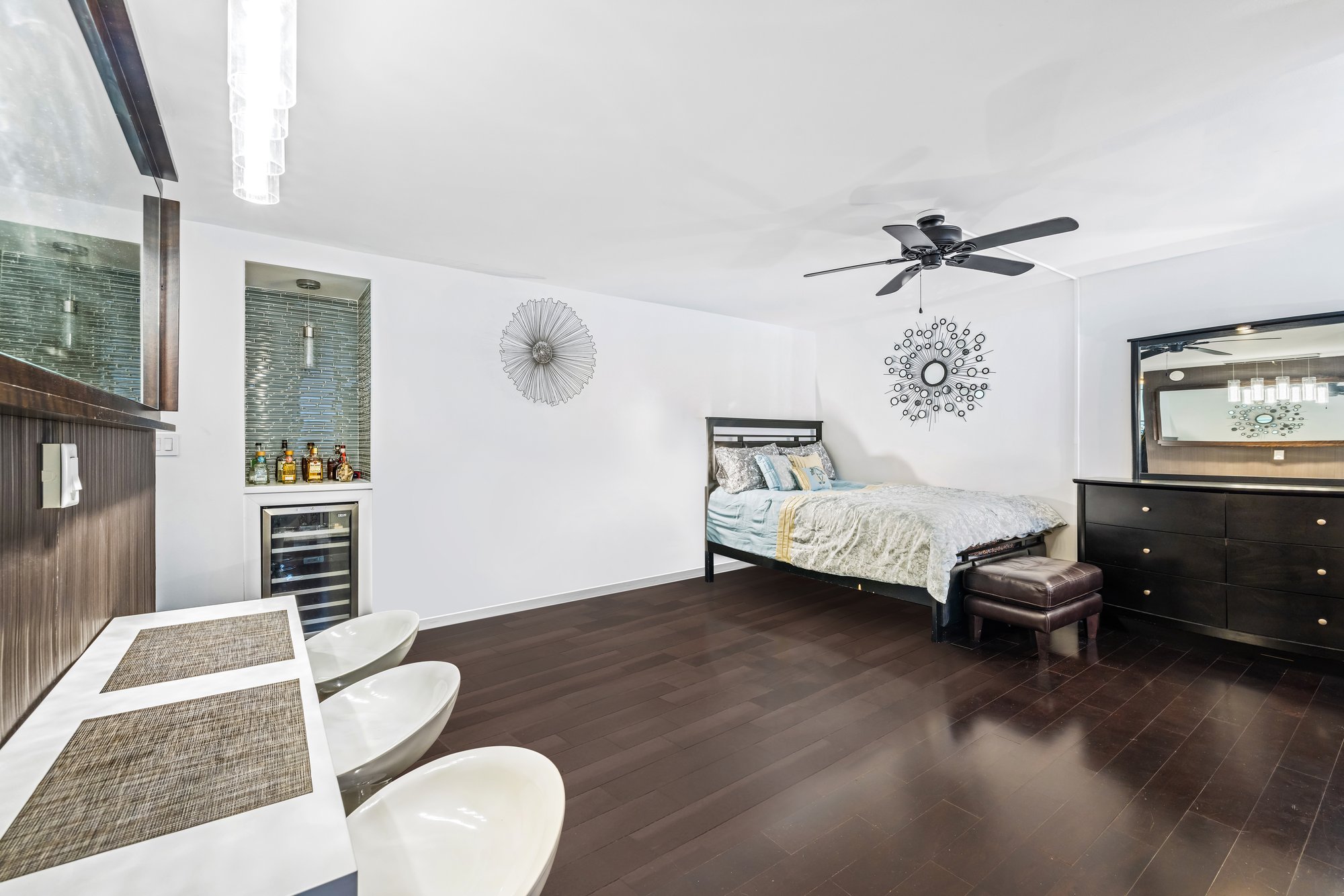 139 East 33rd Street, Unit 3M Manhattan, NY 10016 - Photo 4 of 11 a living room with furniture and a wooden floor