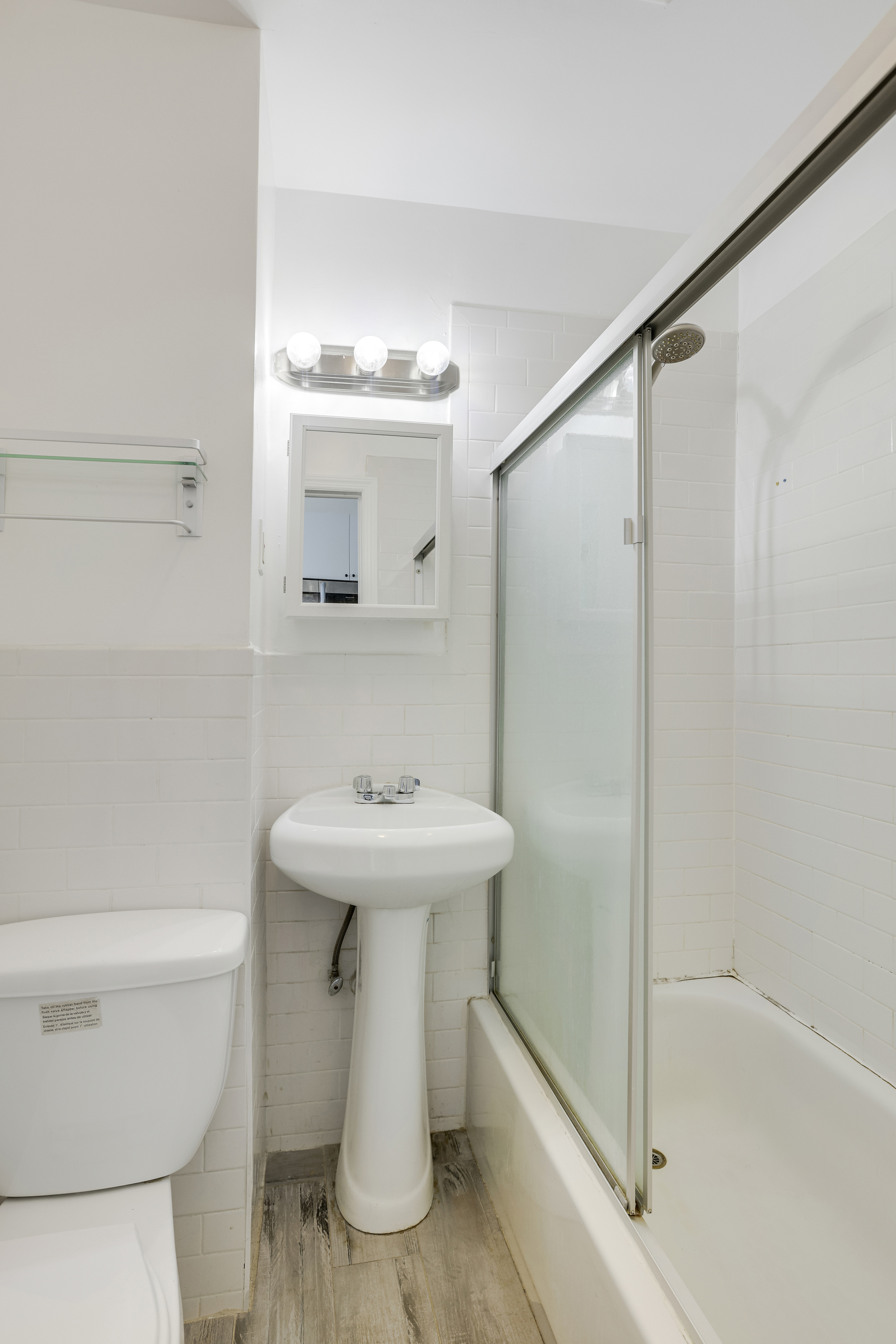 100 Powers Street, Unit 3L Brooklyn, NY 11211 - Photo 11 of 17 a bathroom with a sink toilet and shower