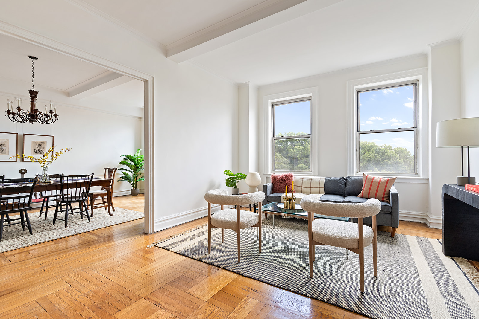 41 Eastern Parkway, Unit 8B Brooklyn, NY 11238 - Photo 3 of 13 a living room with furniture water view and large windows
