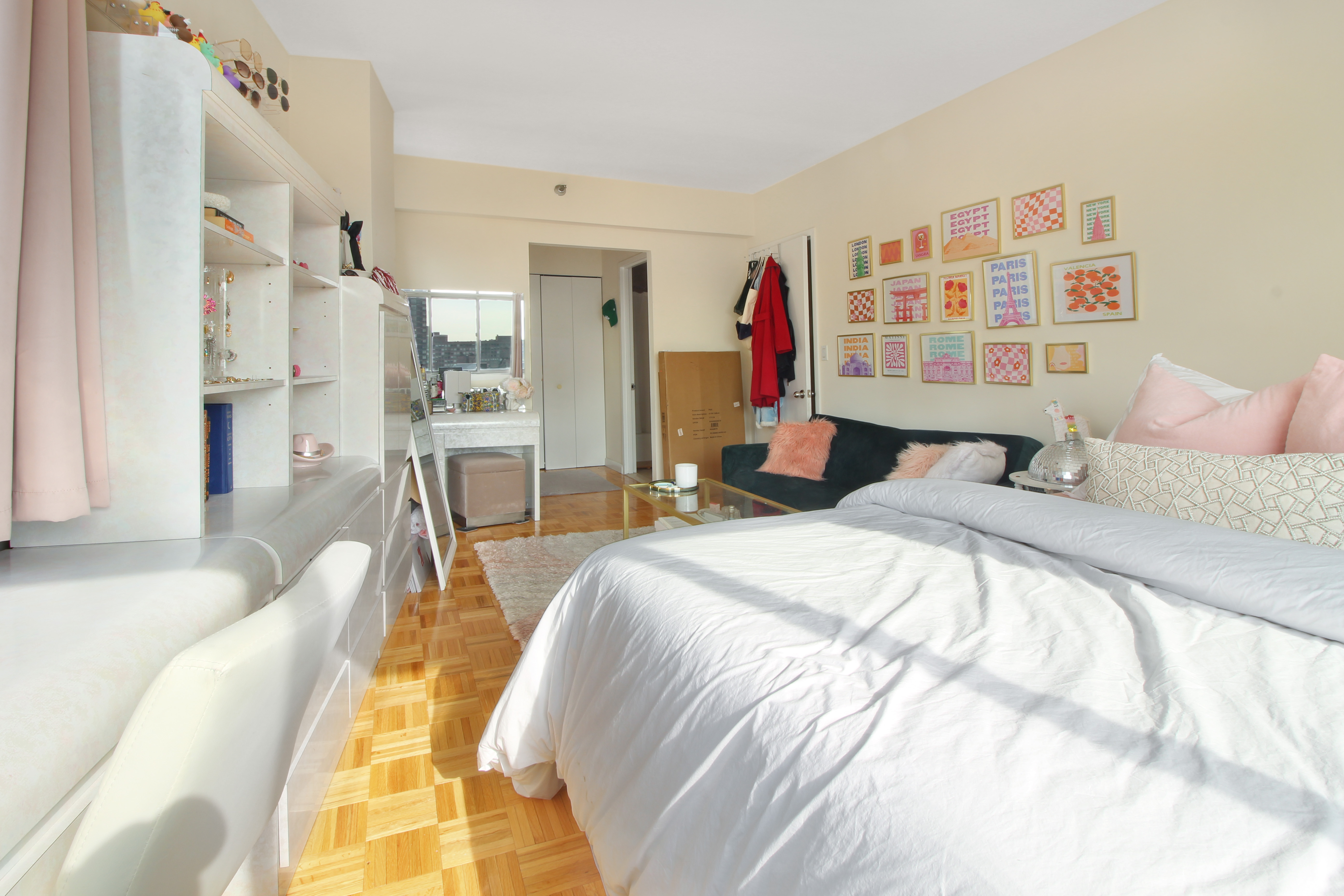 308 East 38th Street, Unit 20A Manhattan, NY 10016 - Photo 7 of 13 a bedroom with a bed and a flat screen tv