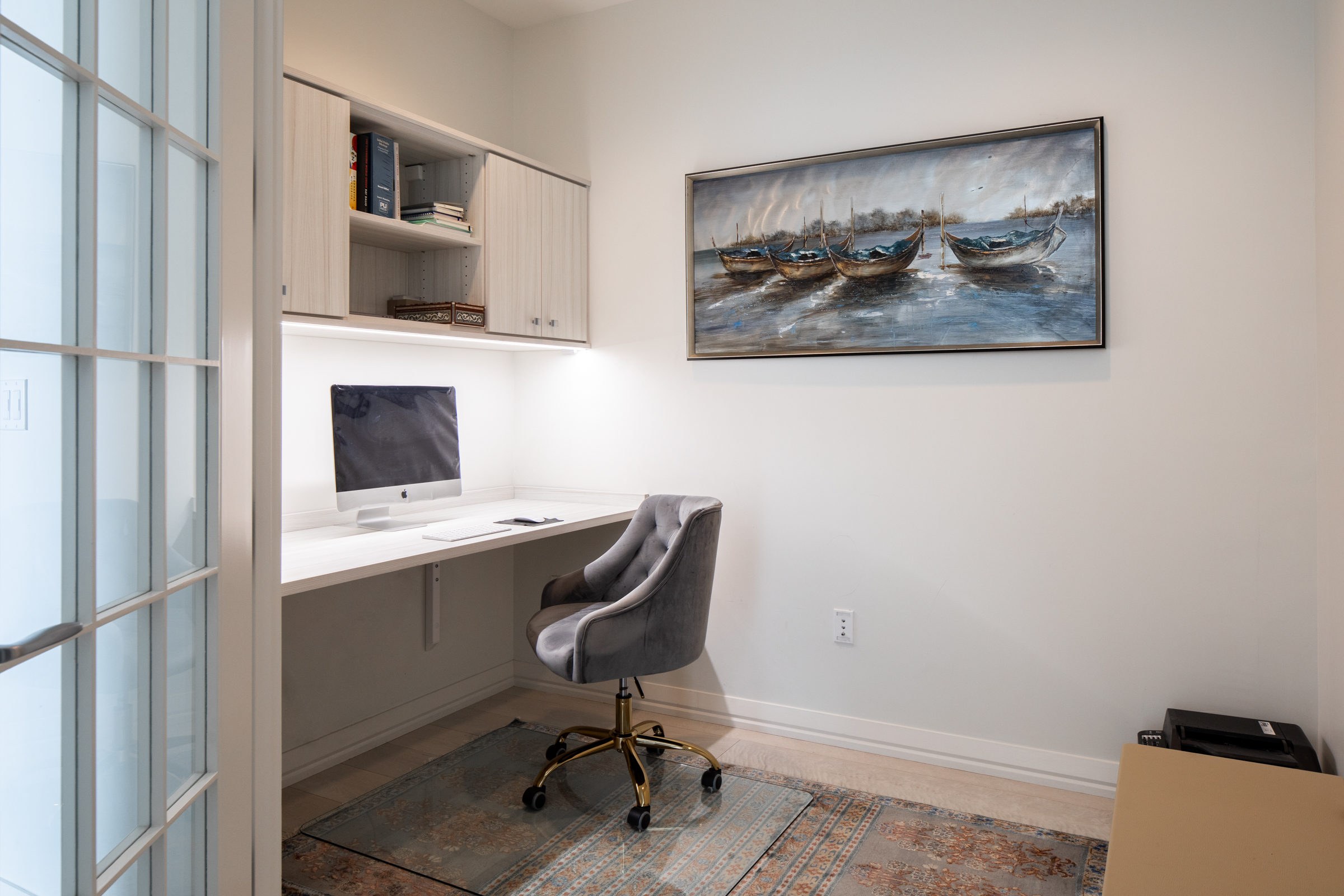 1 Franklin Street, Unit PH2D Boston, MA 02110 - Photo 26 of 26 a view of a workspace with furniture and a window