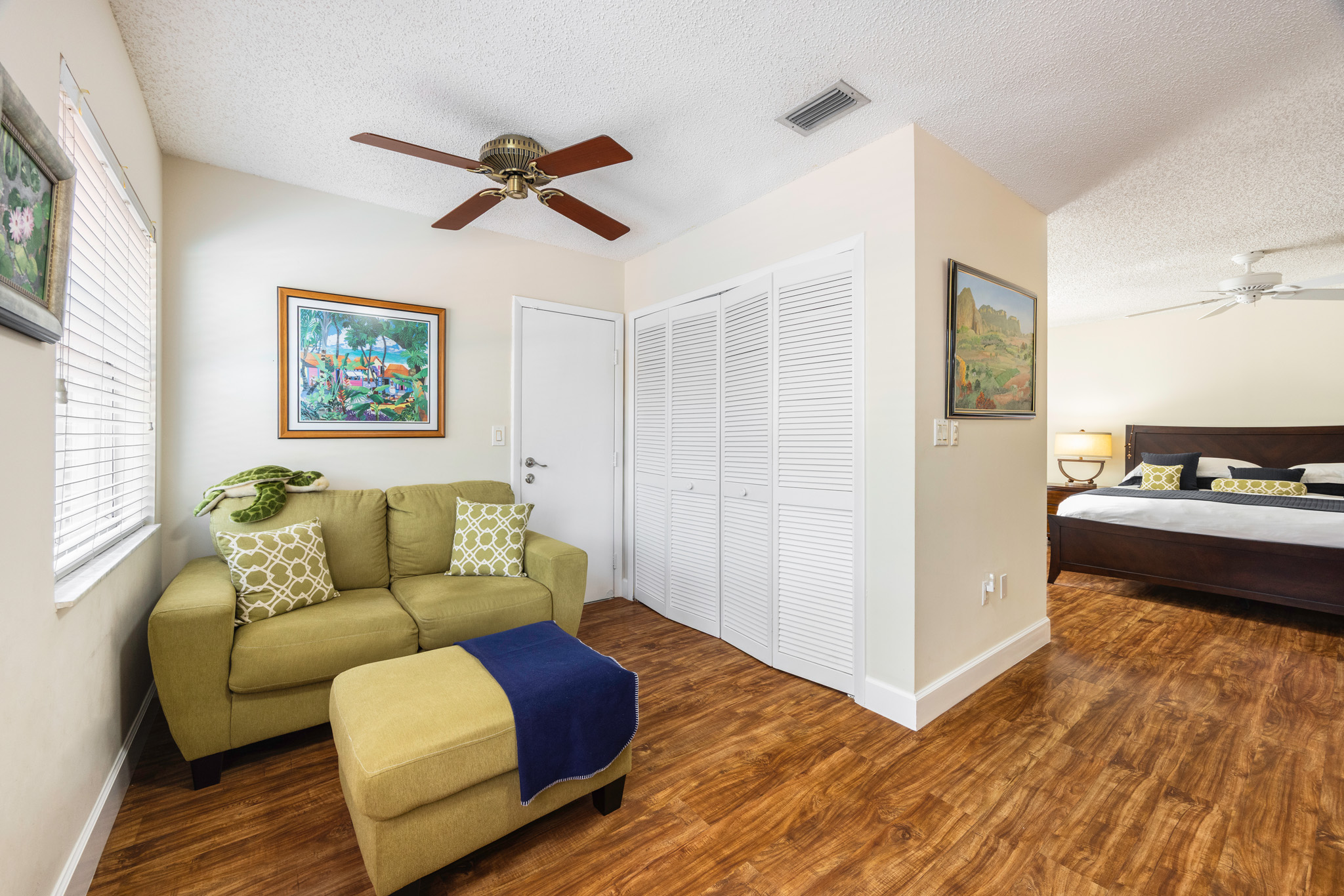 8610 Southwest 83rd Street Miami, FL 33143 - Photo 23 of 46 a living room with furniture and a wooden floor