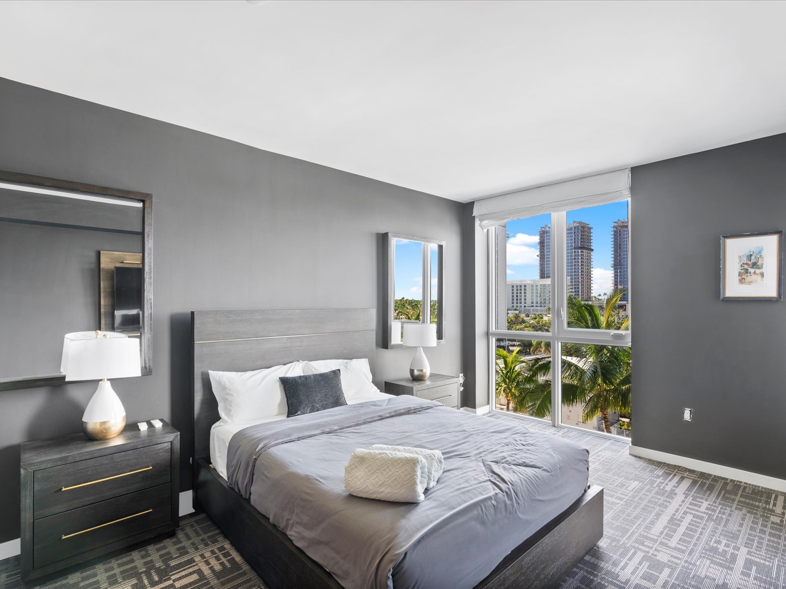 401 North Birch Road, Unit 603 Fort Lauderdale, FL 33304 - Photo 10 of 16 a bedroom with a bed and window