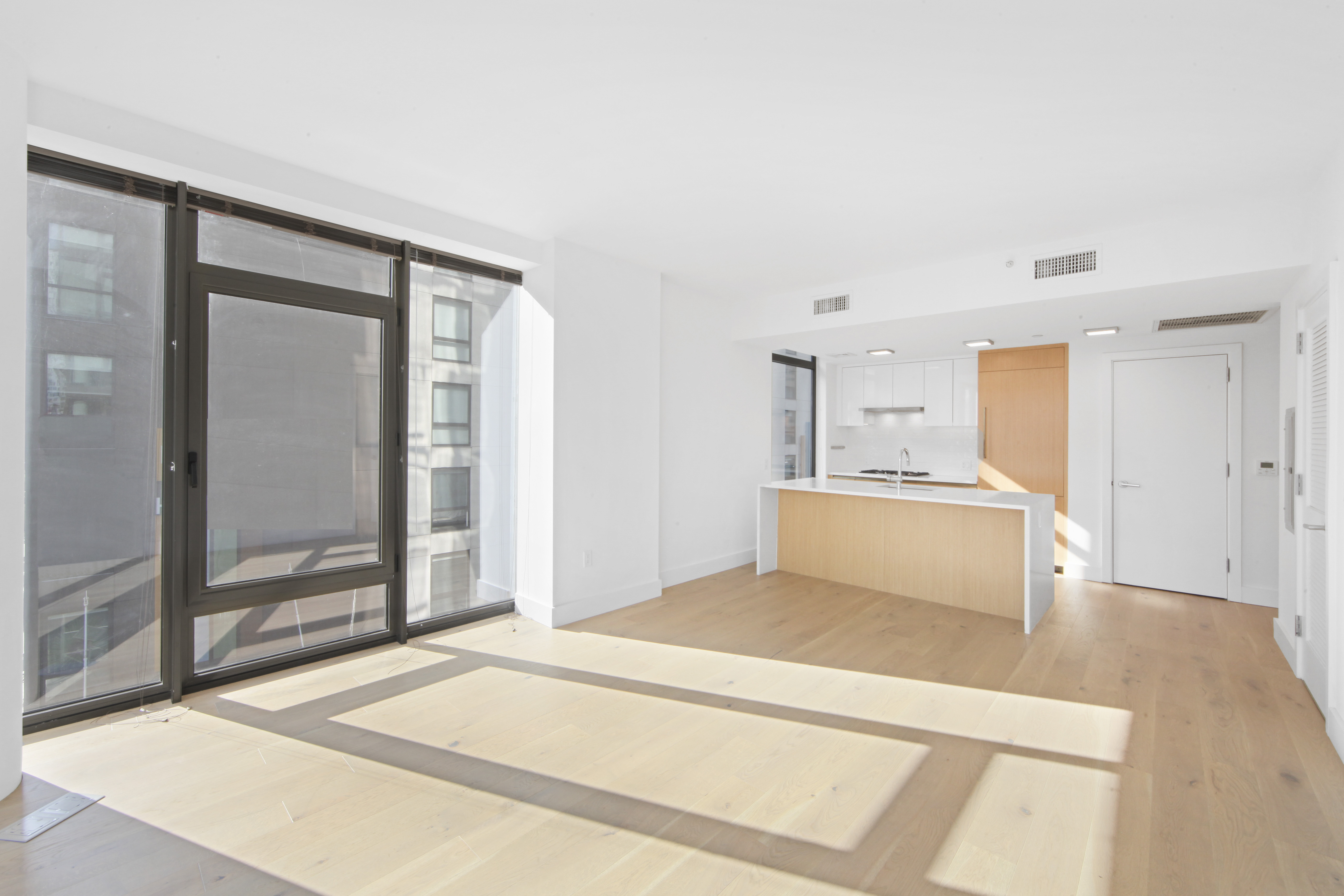 319 Schermerhorn Street, Unit 4B Brooklyn, NY 11217 - Photo 4 of 18 a large white bed in a white room