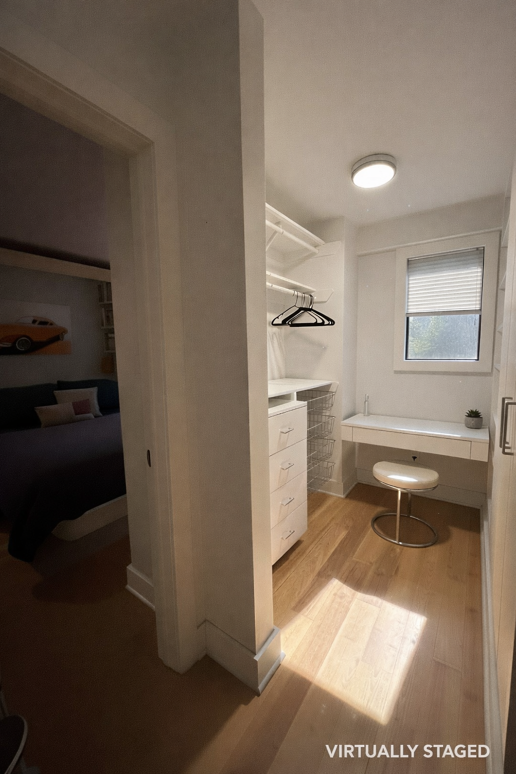 31 Jane Street, Unit 2CD Manhattan, NY 10014 - Photo 8 of 18 a bathroom with a toilet sink and mirror