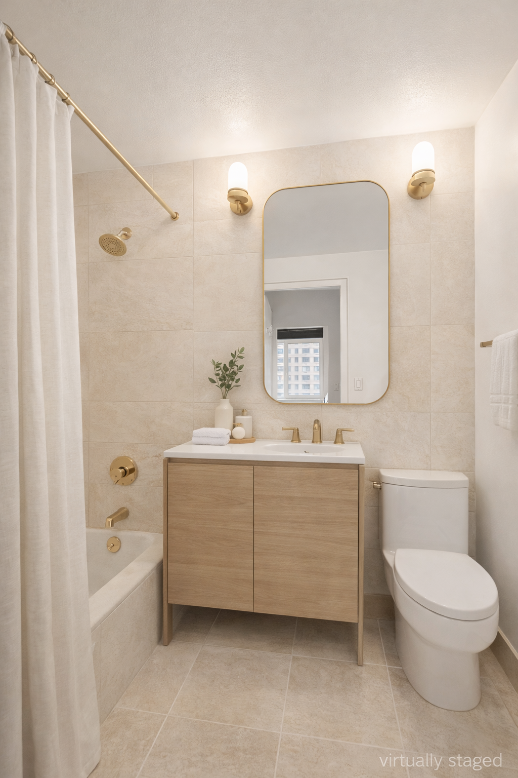45 West 67th Street, Unit 14D Manhattan, NY 10023 - Photo 5 of 13 a bathroom with a toilet a sink and bathtub
