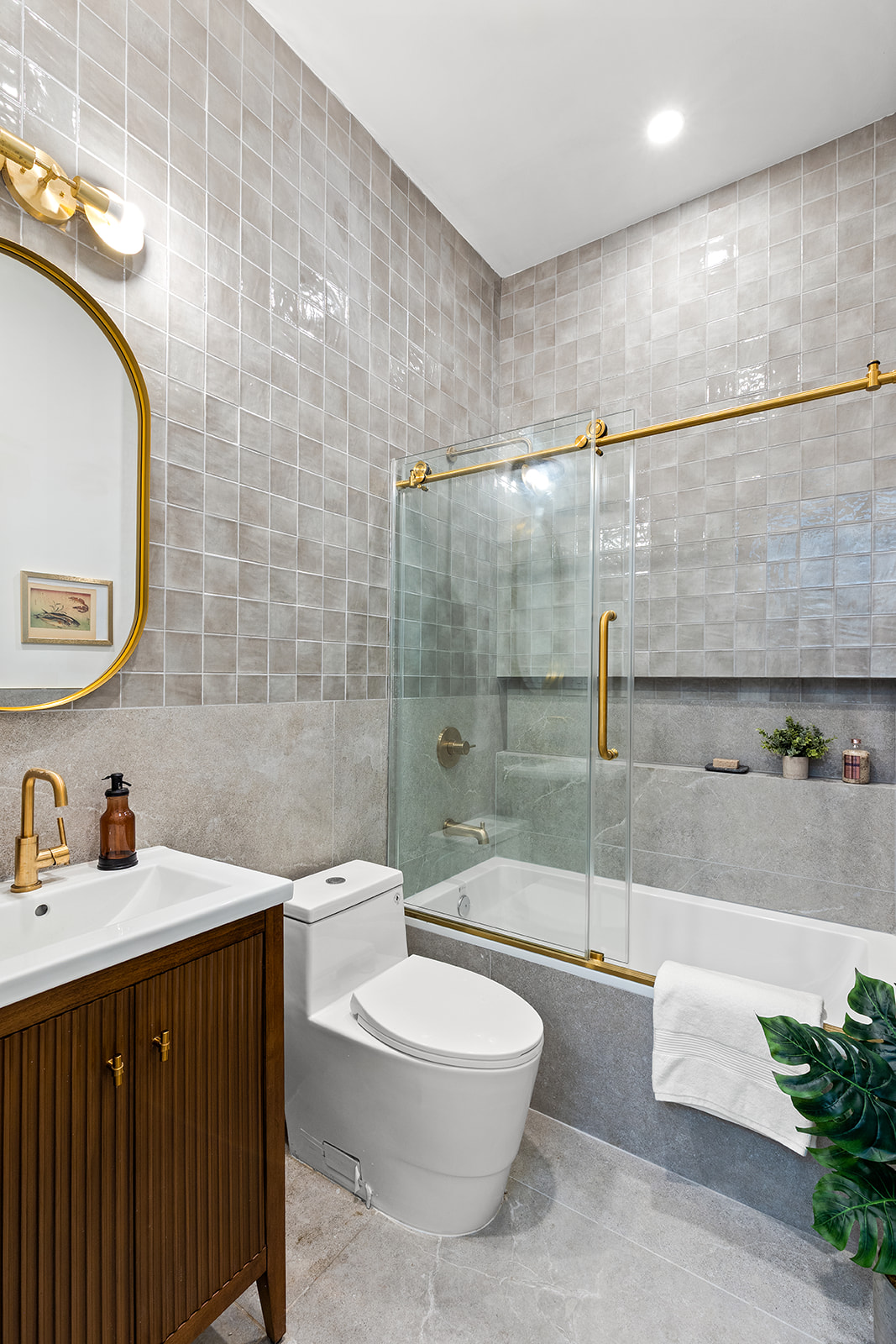 118 Schaefer Street Brooklyn, NY 11207 - Photo 11 of 16 a bathroom with a sink a toilet and shower