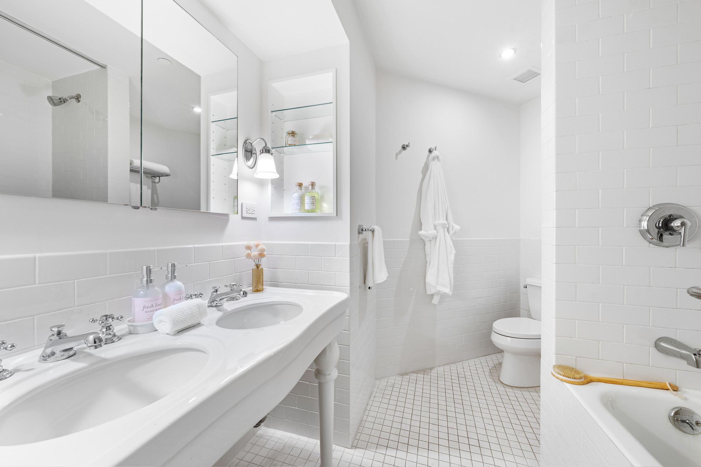 1200 Broadway, Unit PH89 Manhattan, NY 10001 - Photo 28 of 47 a bathroom with a sink toilet and shower