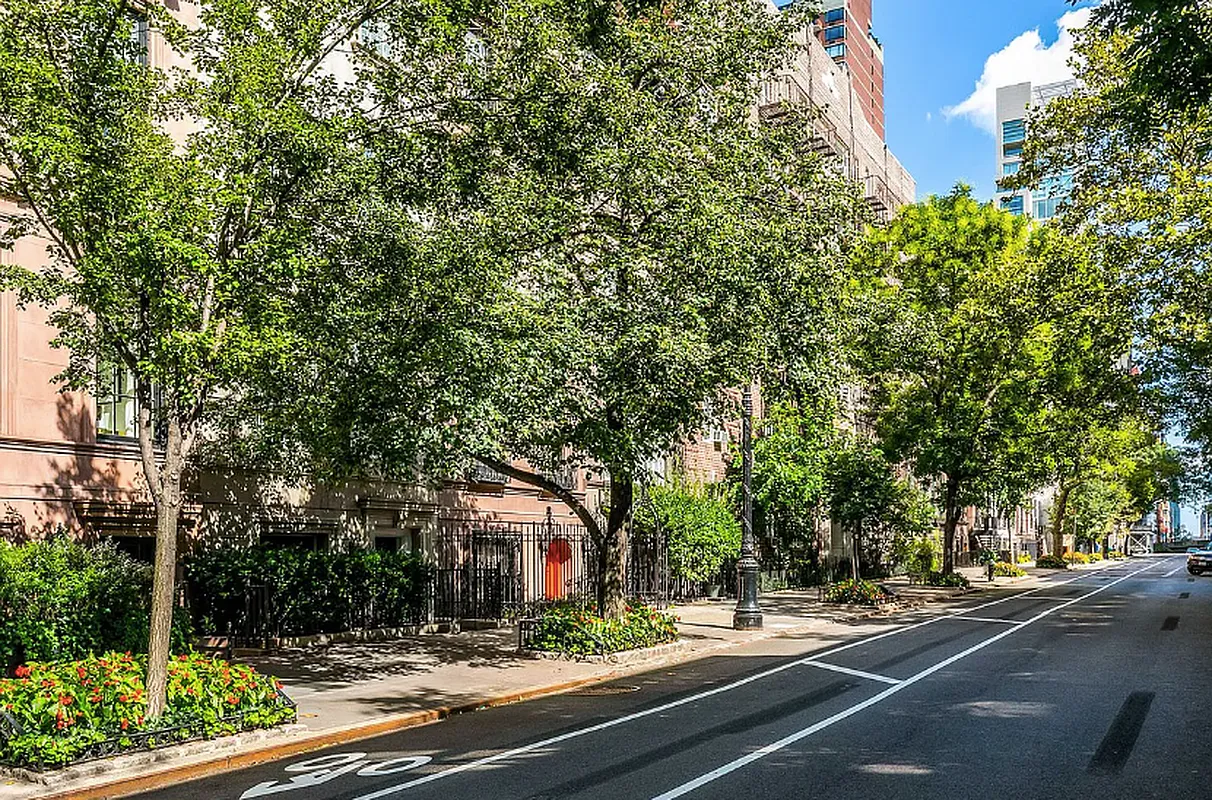 222 East 61st Street Manhattan, NY 10065 - Photo 27 of 28 a view of a street with houses