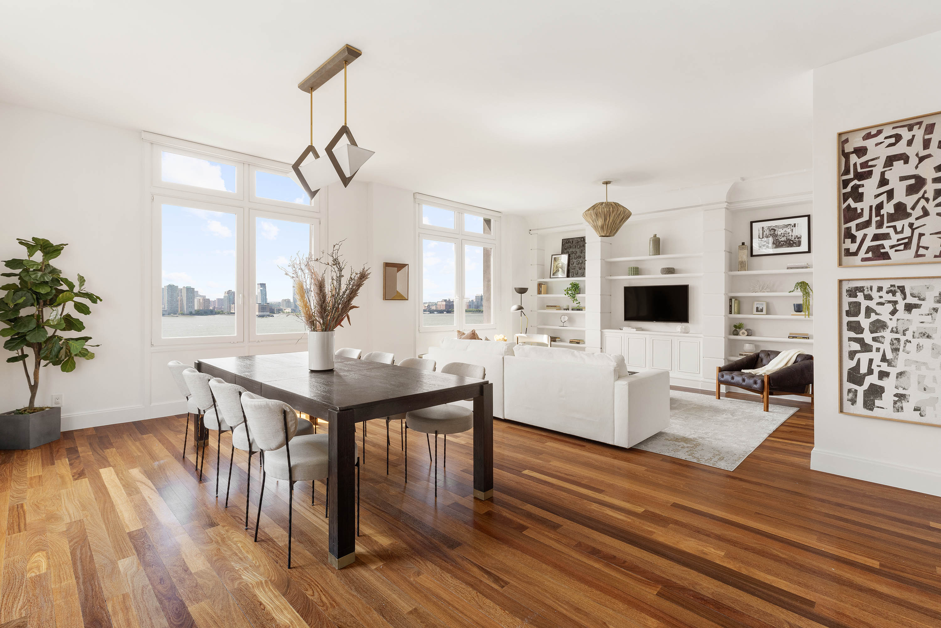 92 Laight Street, Unit 11A Manhattan, NY 10013 - Photo 2 of 15 a living room with furniture and wooden floor