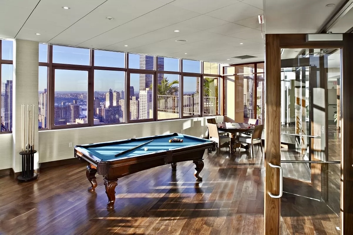 30 West 63rd Street, Unit 7O Manhattan, NY 10023 - Photo 9 of 16 a room with furniture and wooden floor