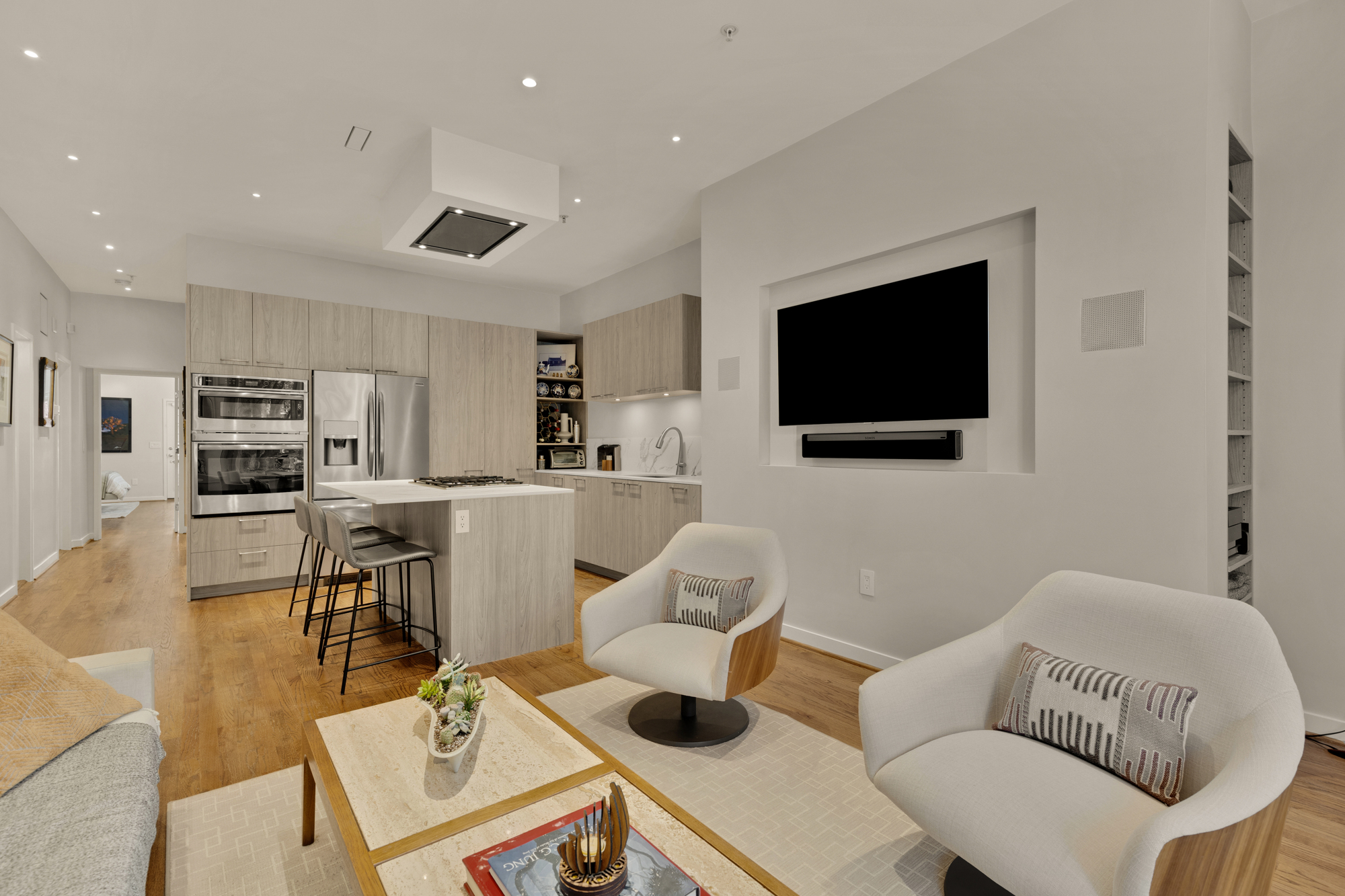 1407 15th Street Northwest, Unit 2 Washington, DC 20005 - Photo 9 of 24 a living room with furniture and a flat screen tv