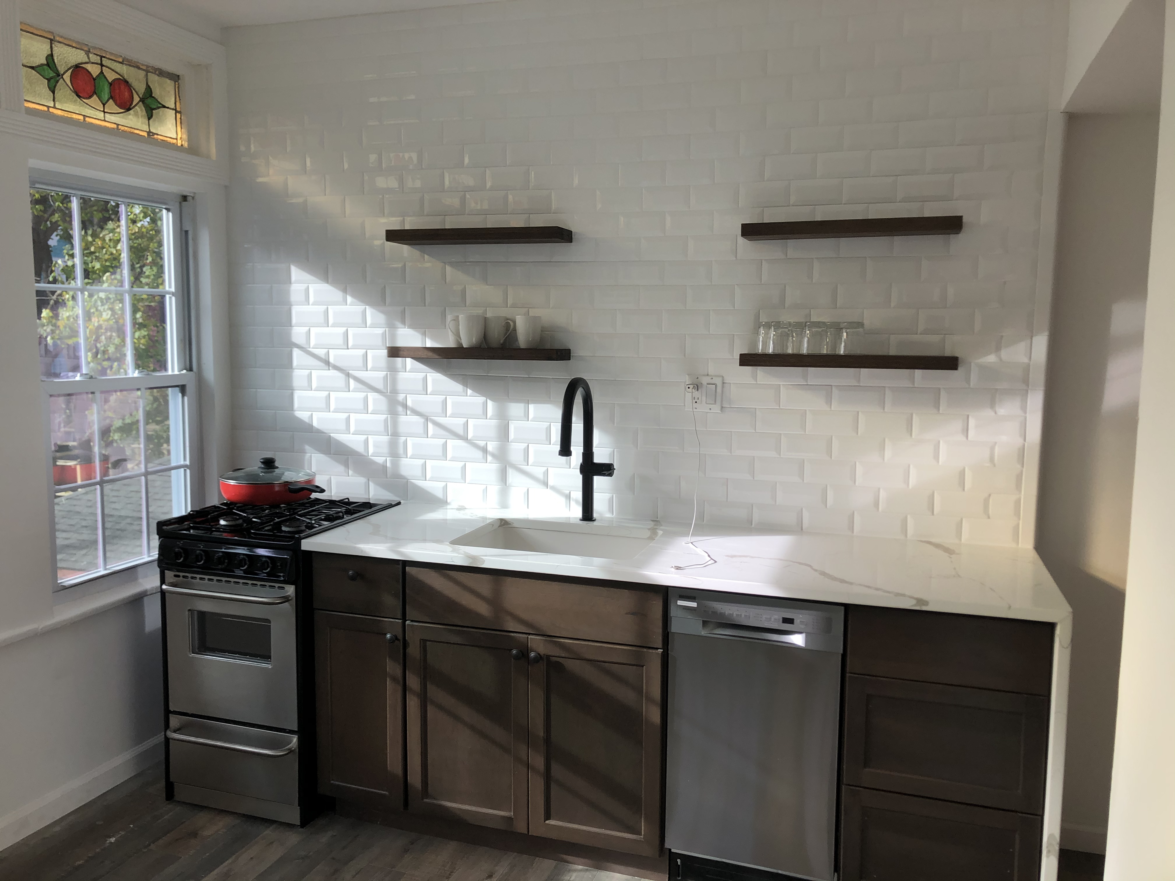 1112 Beverley Road Brooklyn, NY 11218 - Photo 19 of 53 a kitchen with a sink and a stove