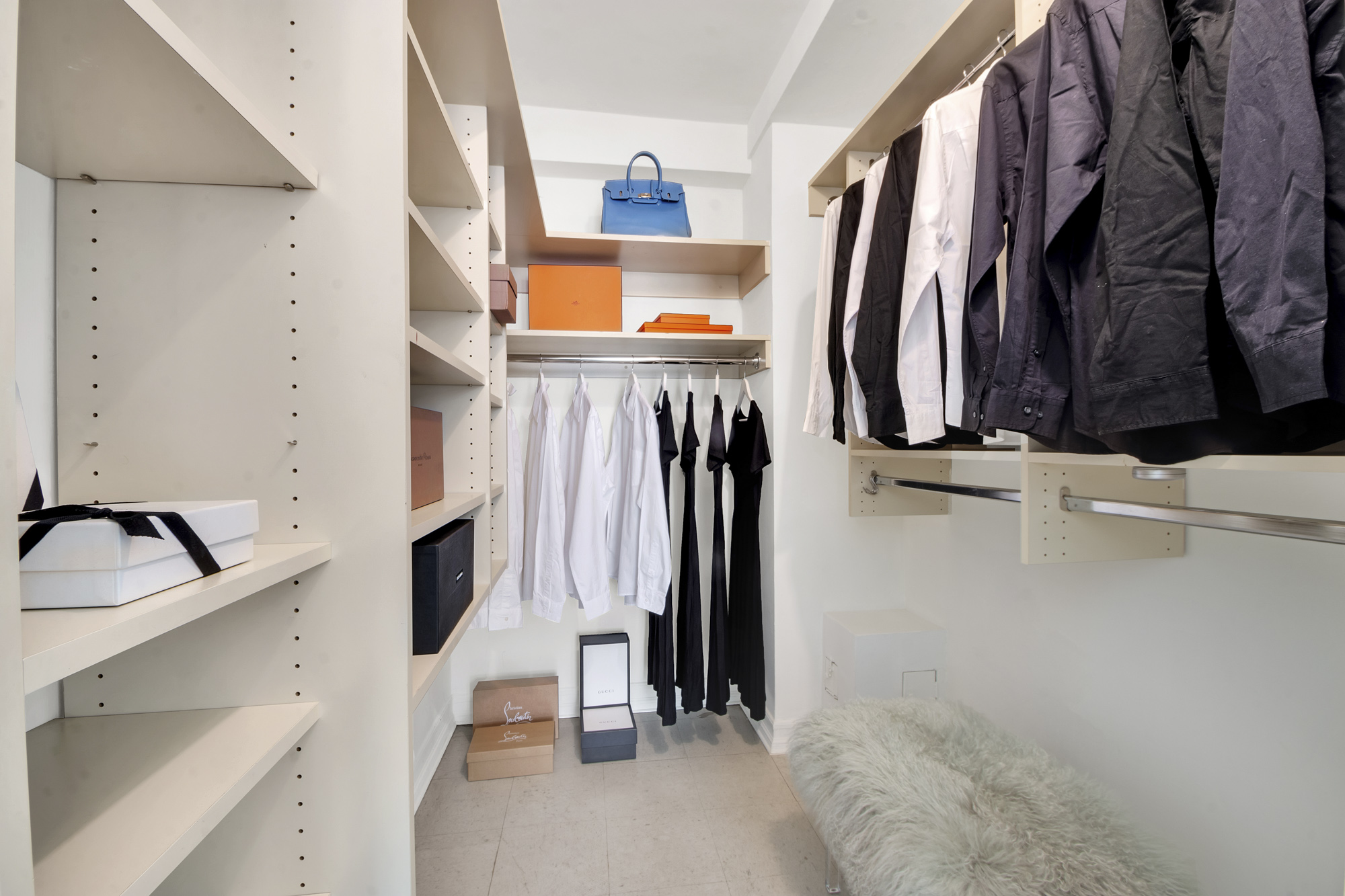 59 West 12th Street, Unit 6A Manhattan, NY 10011 - Photo 10 of 11 a view of walk in closet with clothes and shoes