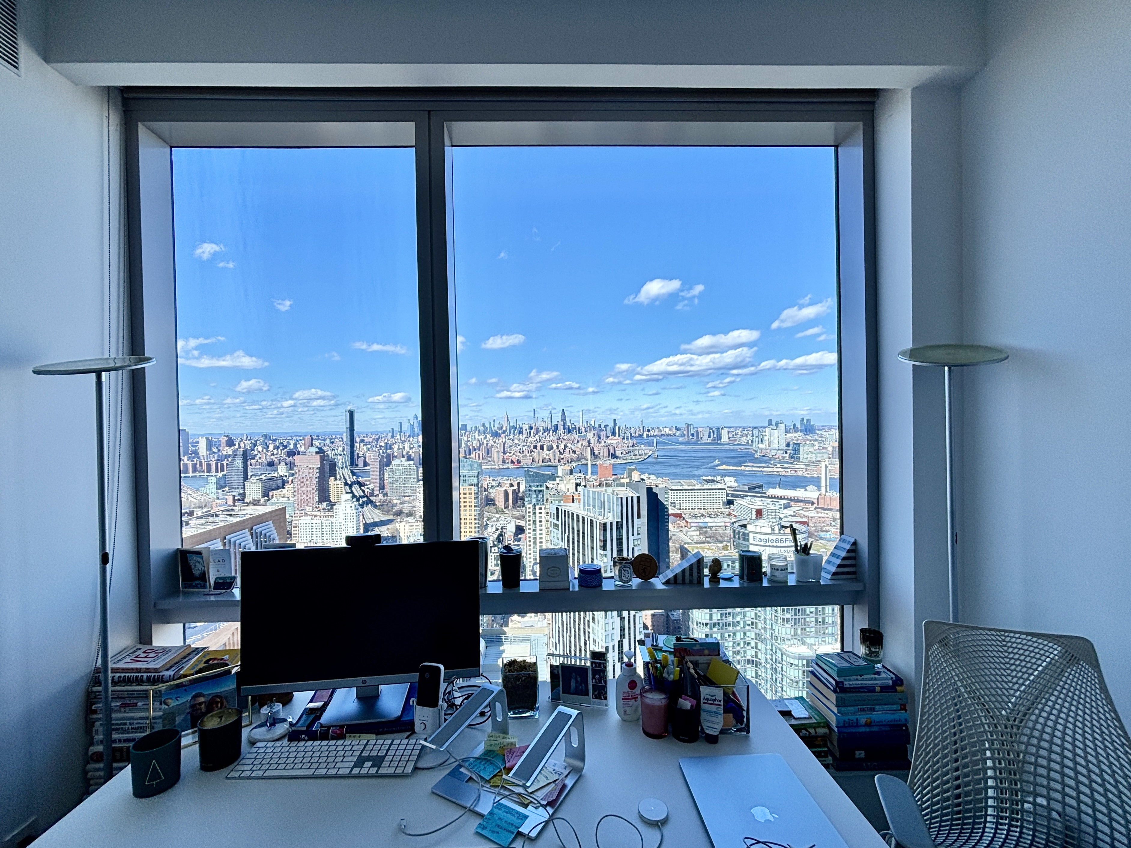 1 City Point, Unit 50B Brooklyn, NY 11201 - Photo 9 of 29 a view of a balcony with furniture and a floor to ceiling window