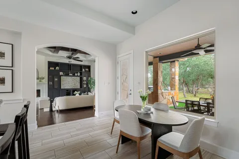 a bed room with a bed and a mirror