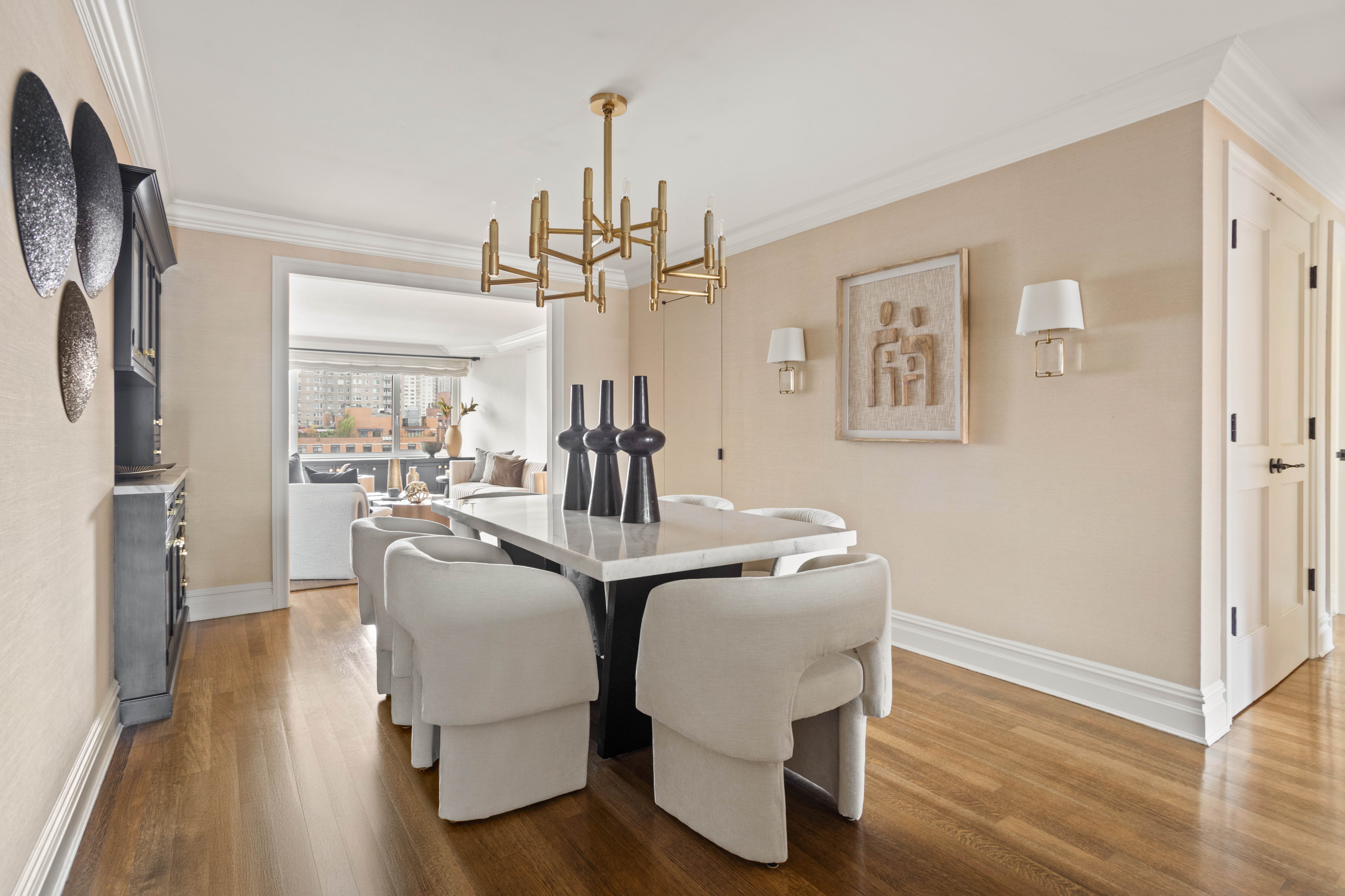 60 East End Avenue, Unit 12C Manhattan, NY 10028 - Photo 4 of 27 a view of a dining room with furniture and wooden floor