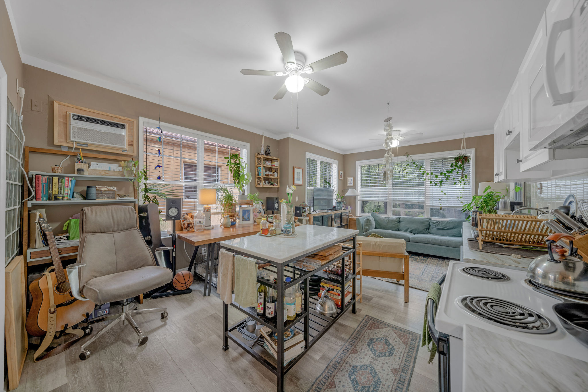 735-745 Meridian Avenue Miami Beach, FL 33139 - Photo 12 of 62 a view of a livingroom with furniture and a window