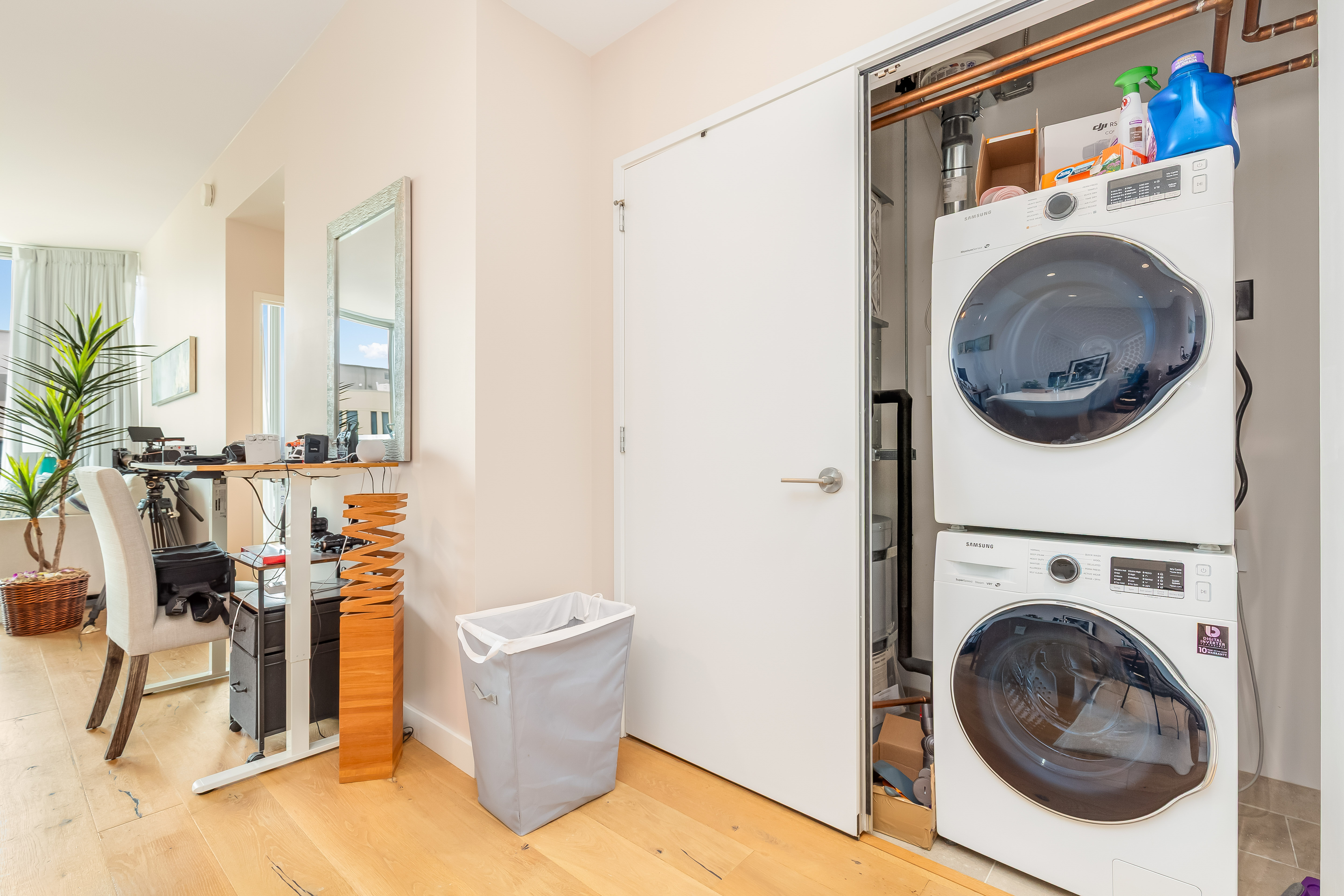 1001 Queen Street Honolulu, HI 96814 - Photo 13 of 29 a view of a storage & utility room with washer and dryer