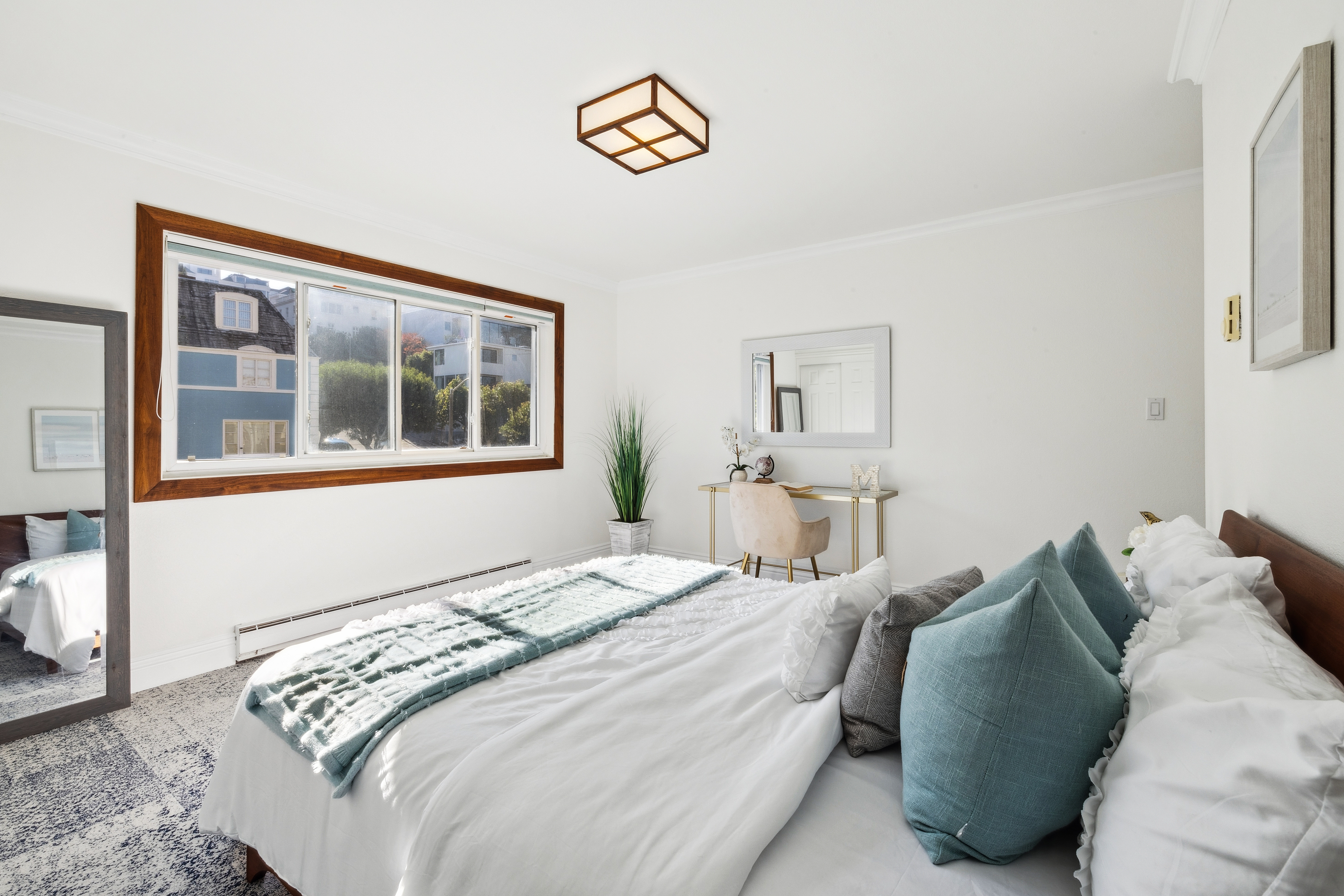 1998 Pacific Avenue San Francisco, CA 94109 - Photo 9 of 28 a bedroom with a bed and a window