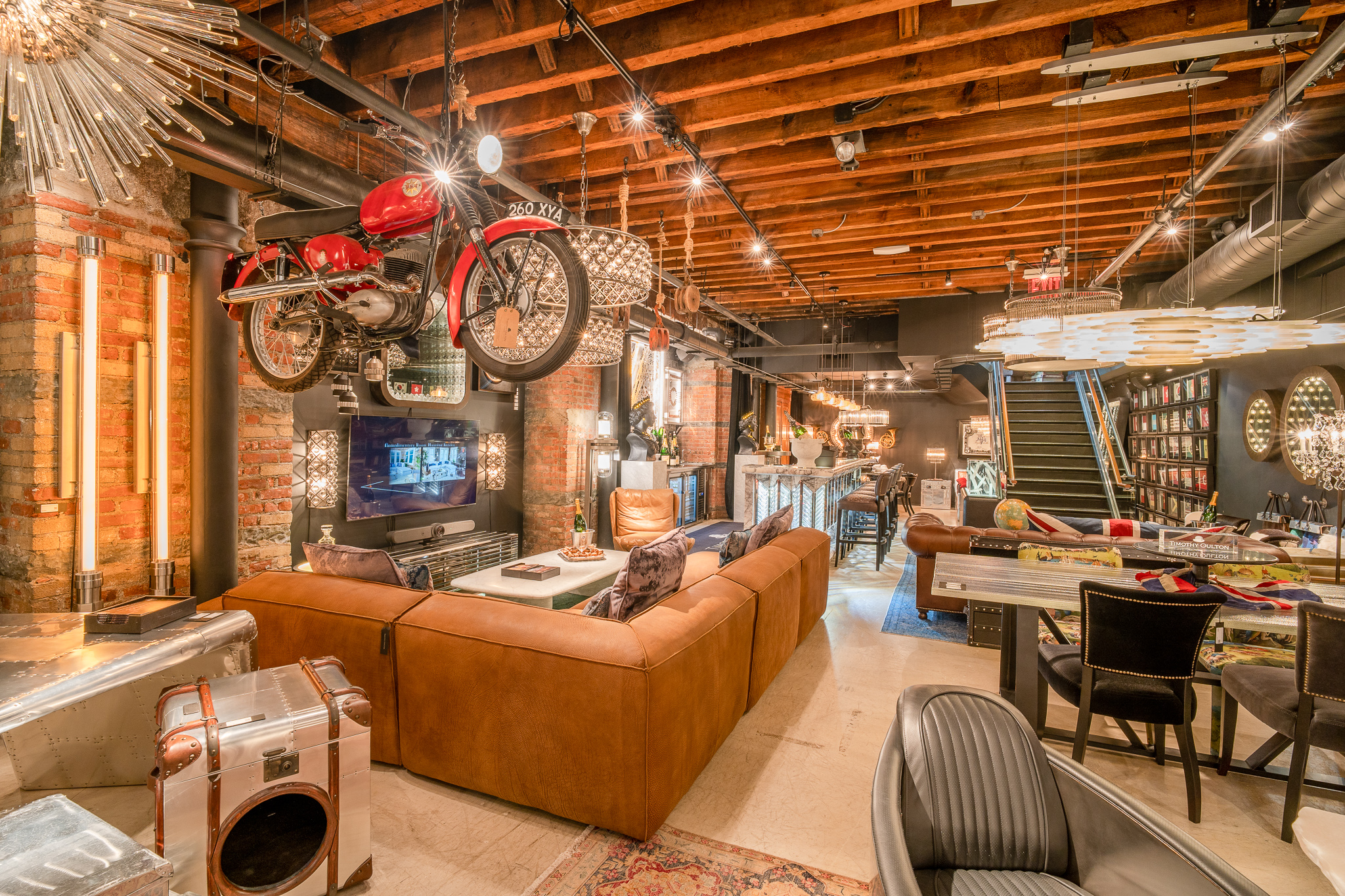901 Broadway, Unit RETAIL Manhattan, NY 10003 - Photo 6 of 8 a living room with fireplace furniture and a large window