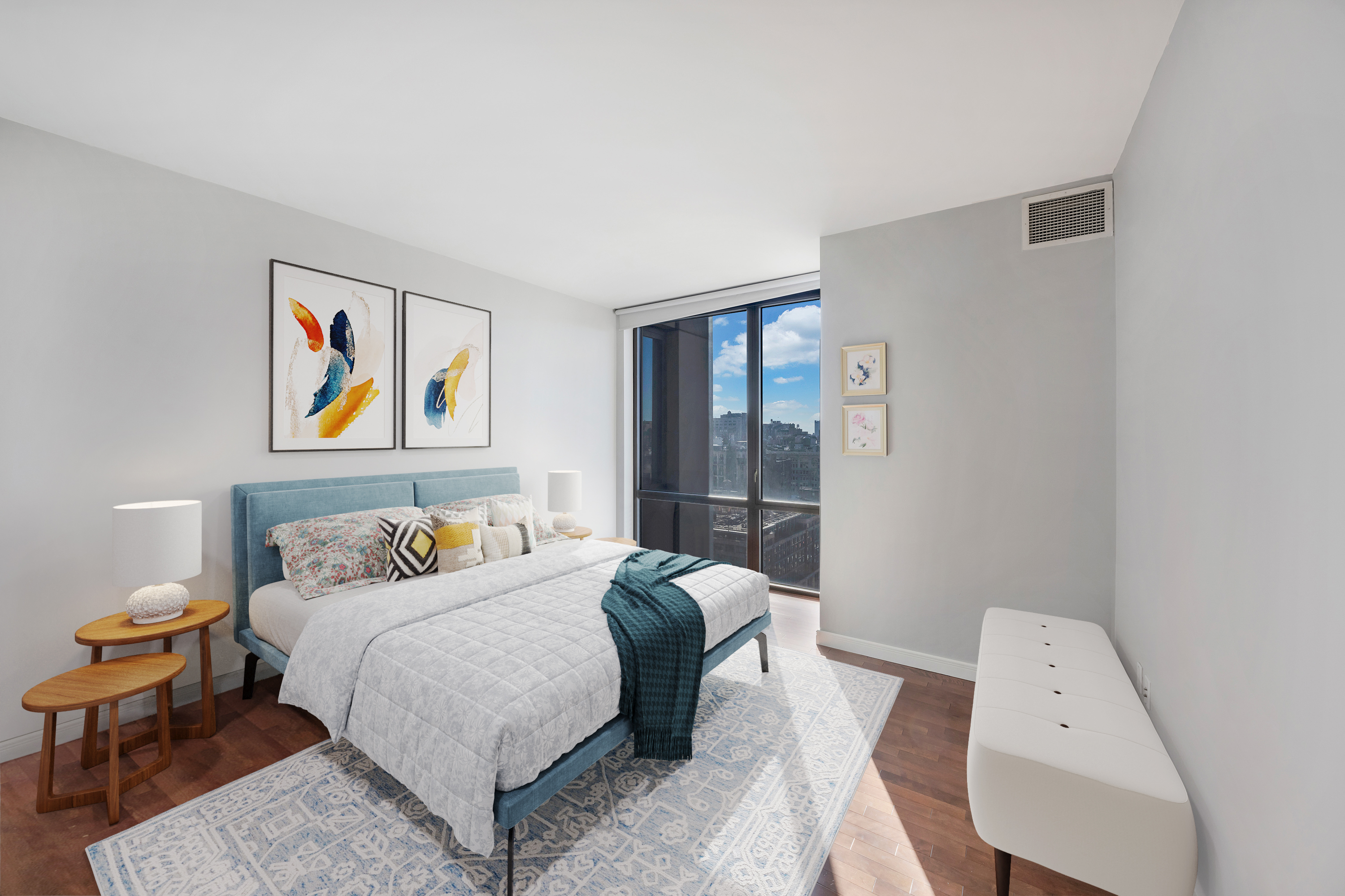 101 West 24th Street, Unit 19B Manhattan, NY 10011 - Photo 8 of 19 a bedroom with a bed and a painting on the wall