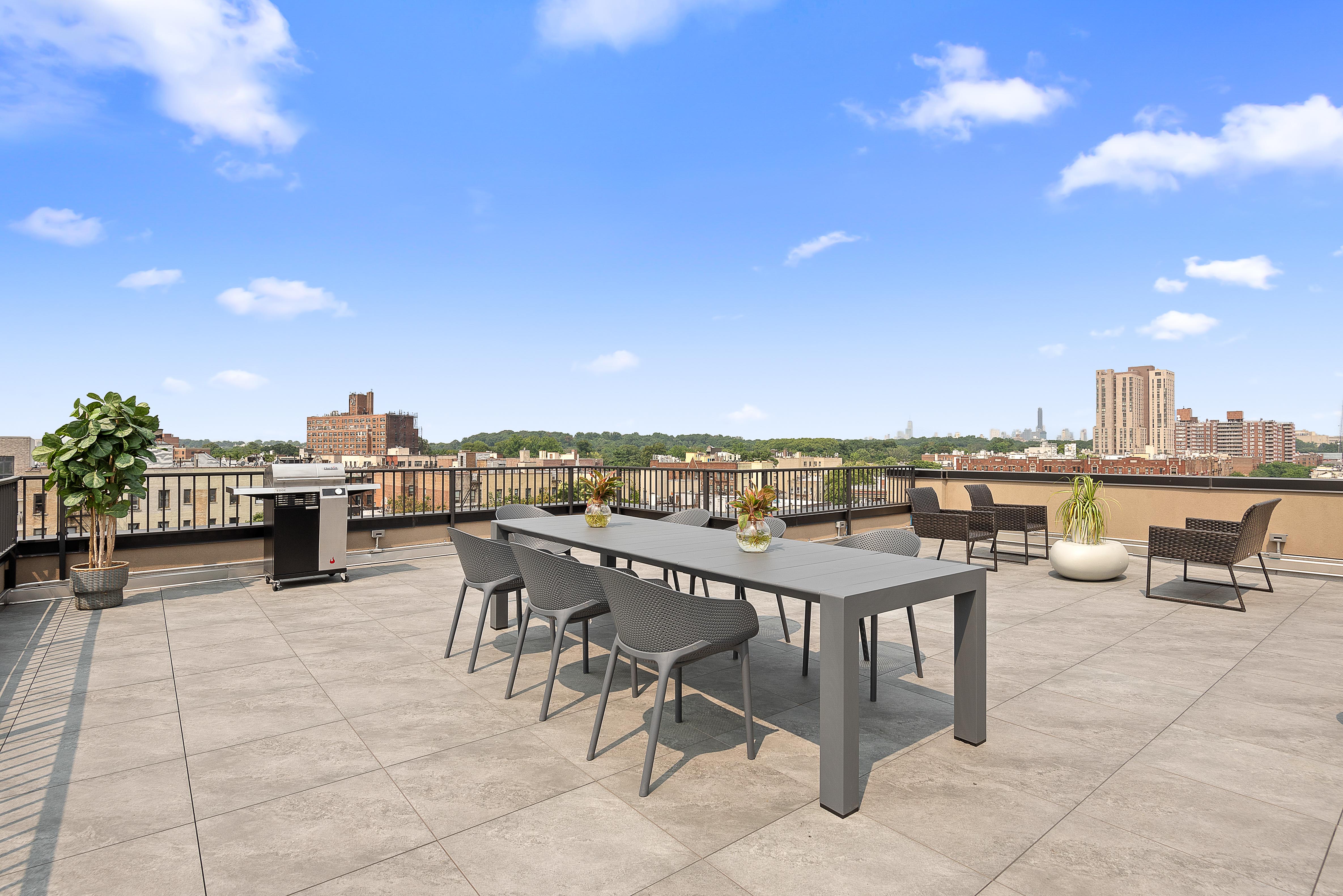 1 Lenox Road, Unit 7B Brooklyn, NY 11226 - Photo 7 of 10 a view of a terrace with furniture and stove